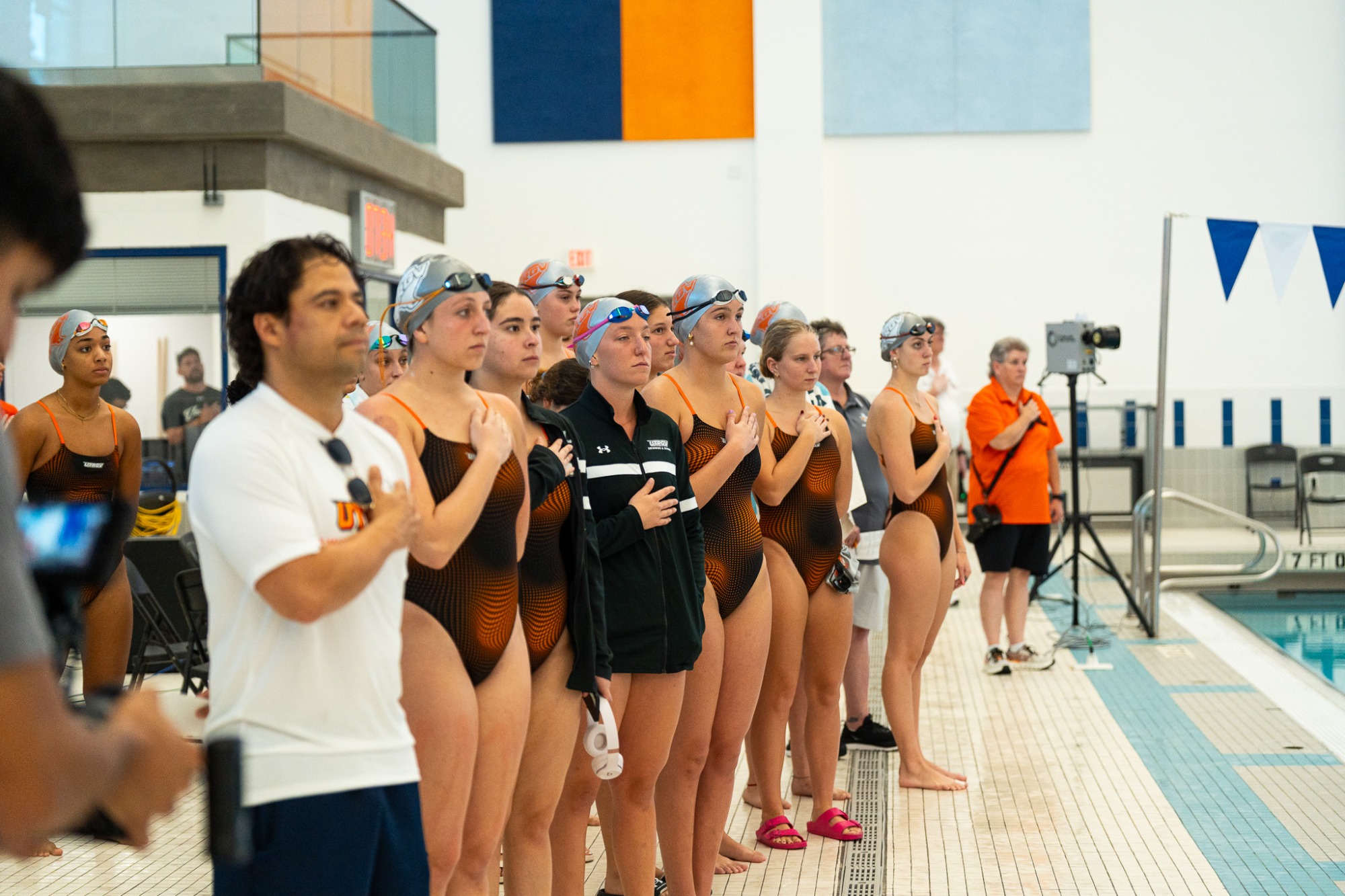 UTRGV Women's Swimming and Diving Team during the national anthem 