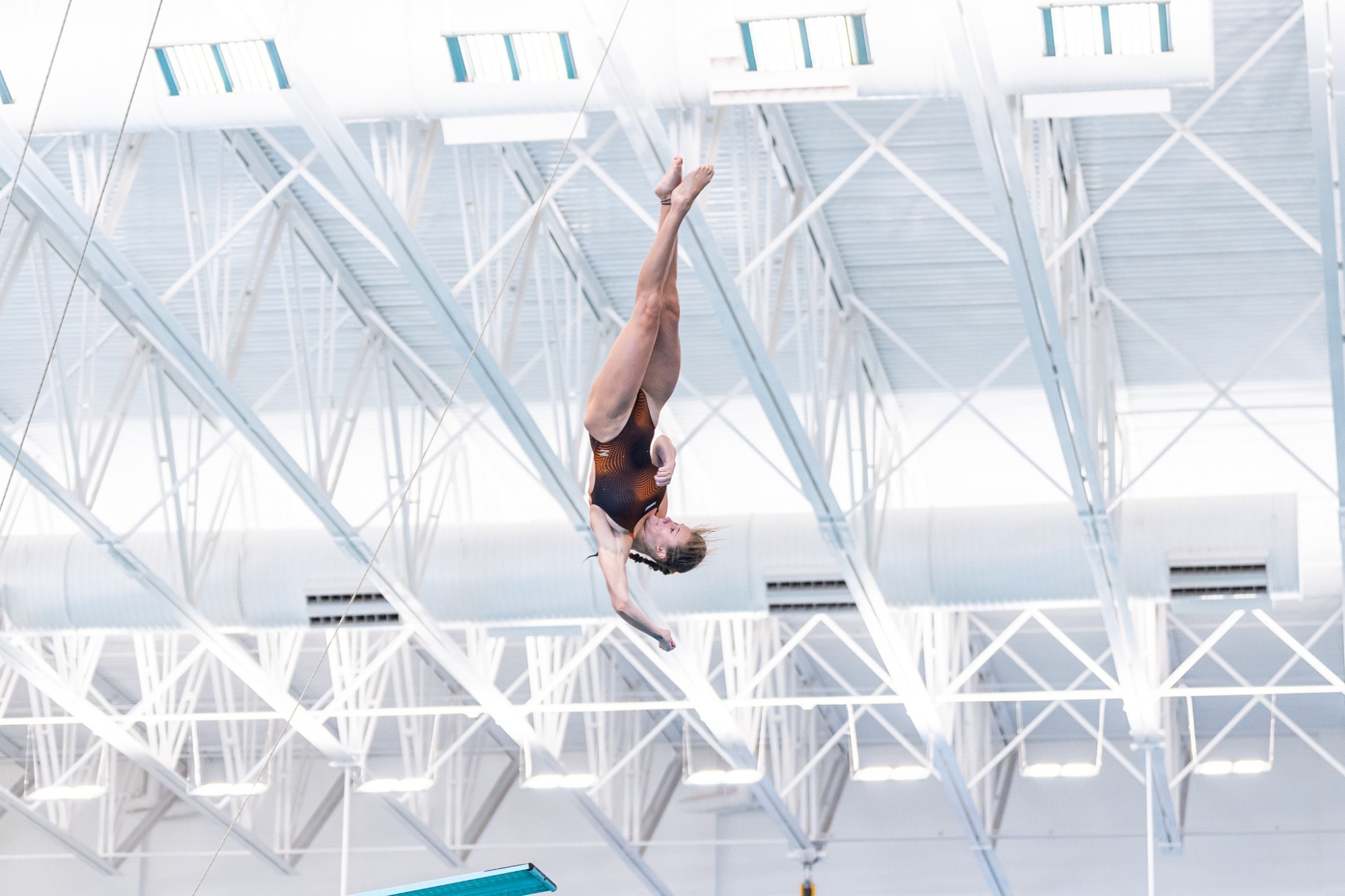 Manou Meulebeek diving photo for 184-110 final vs. New. Mexico