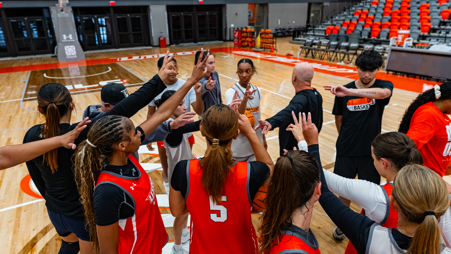Photo of Team Huddle at Women's Basketball