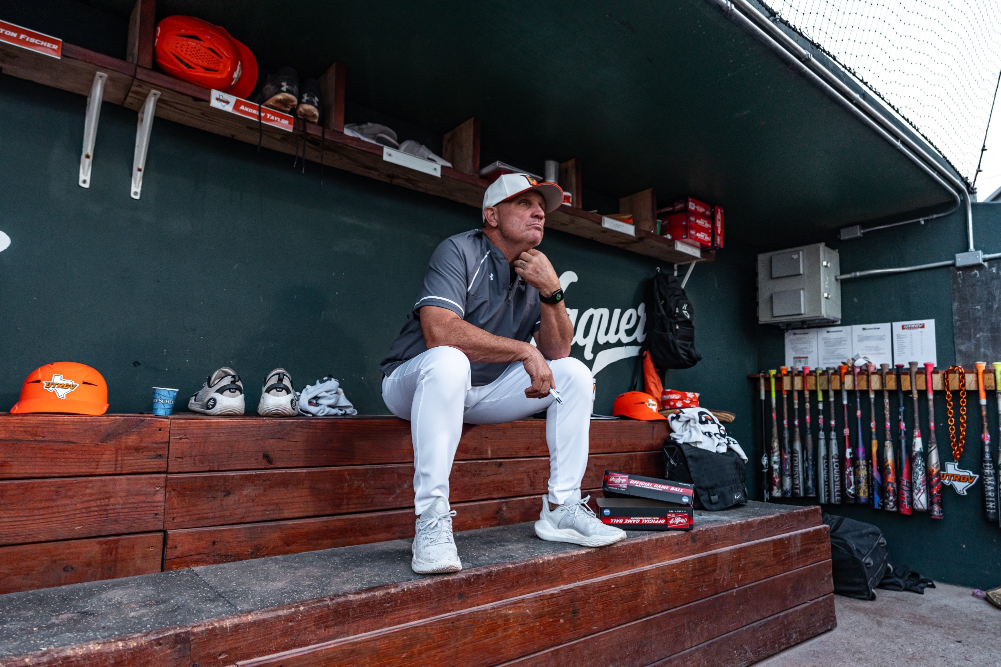 Head coach Derek Matlock in the dugout 