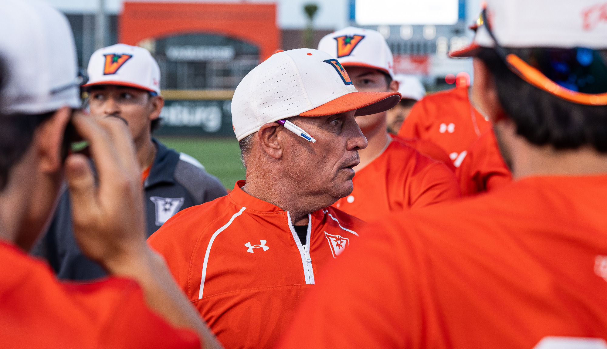 Coach Matlock addressing the baseball team