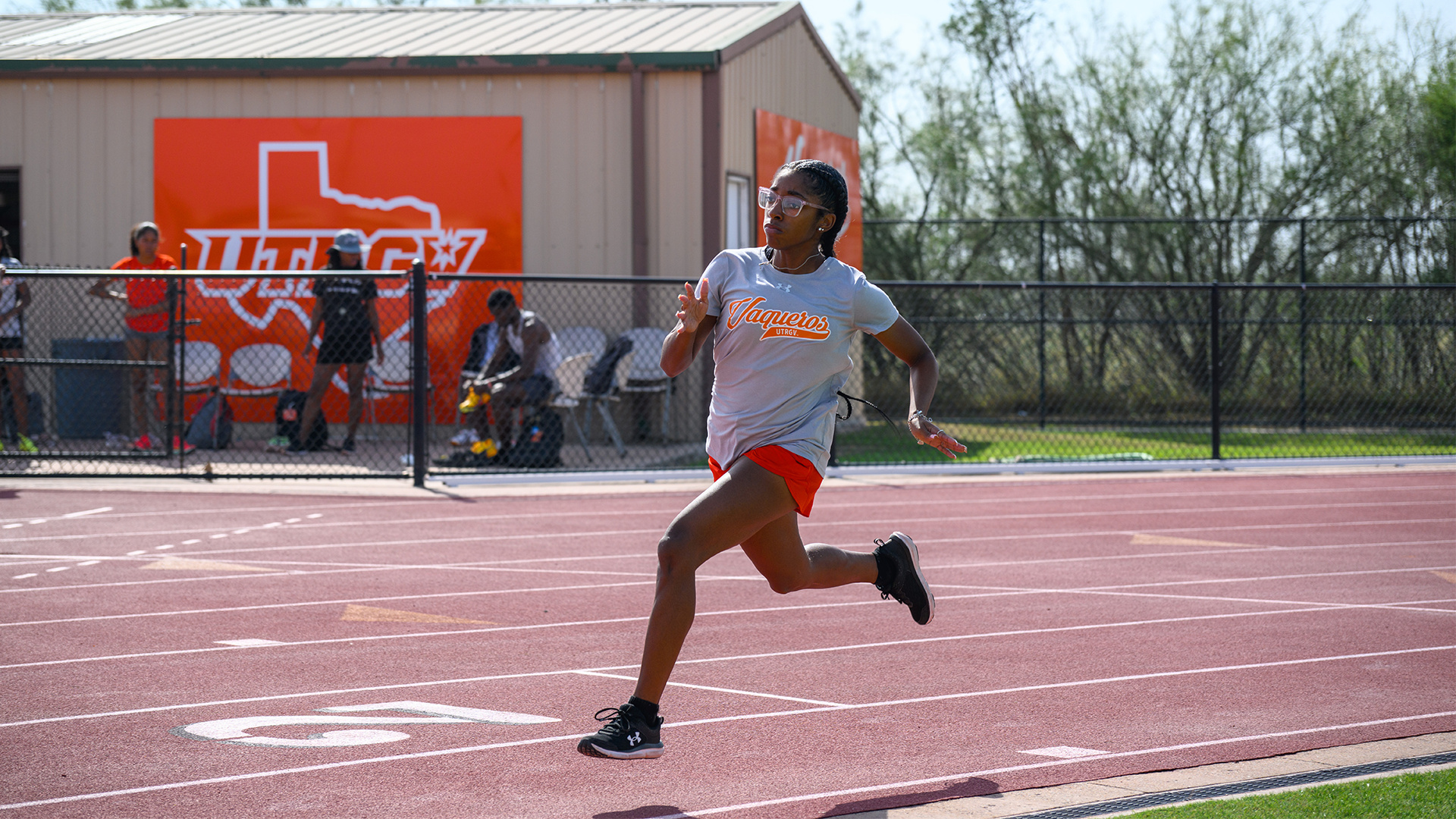 Image is of UTRGV track & field freshman Dior Williams running on the track at the UTRGV Soccer and Track & Field Complex.