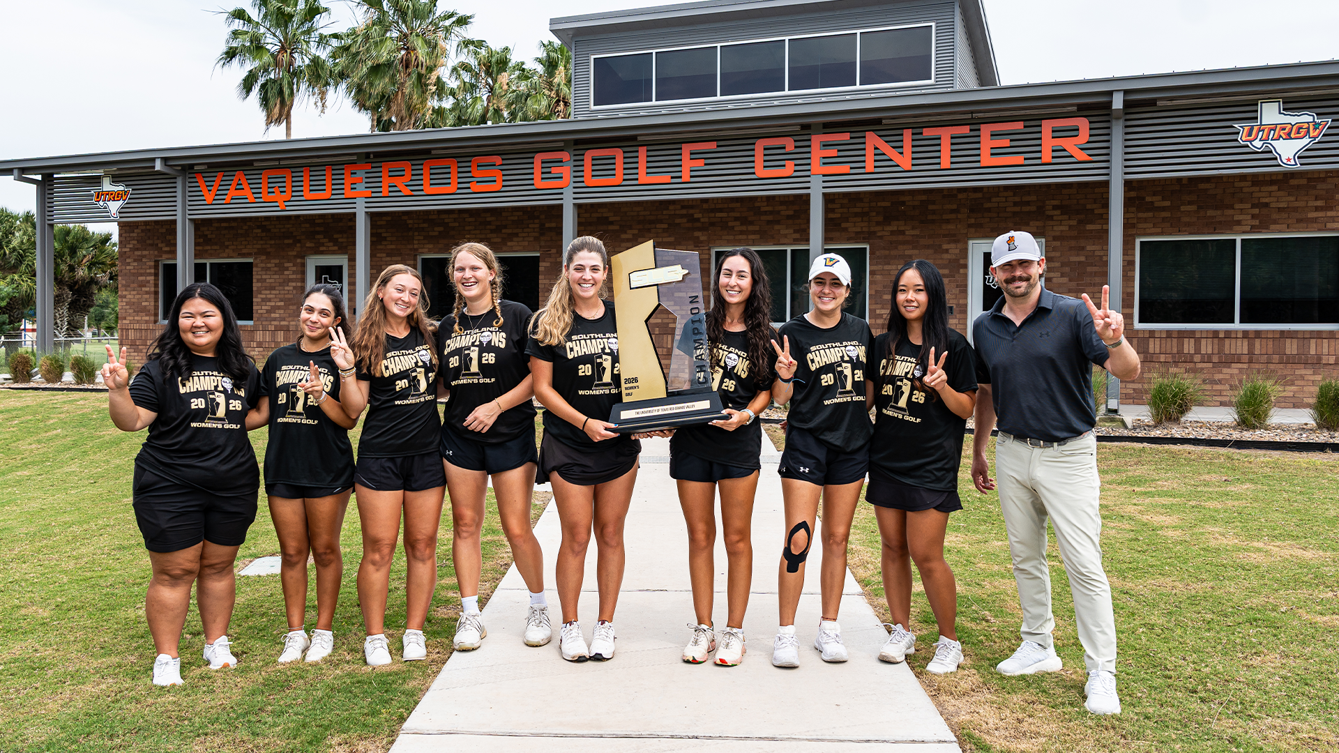 Women's Golf With Trophy in Front of Vaqueros Golf Center