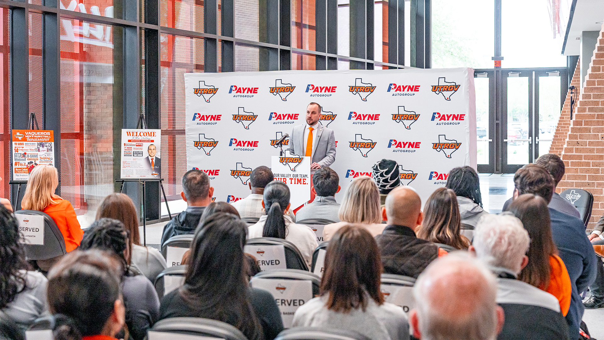 Coach Brandon Chambers at the Podium