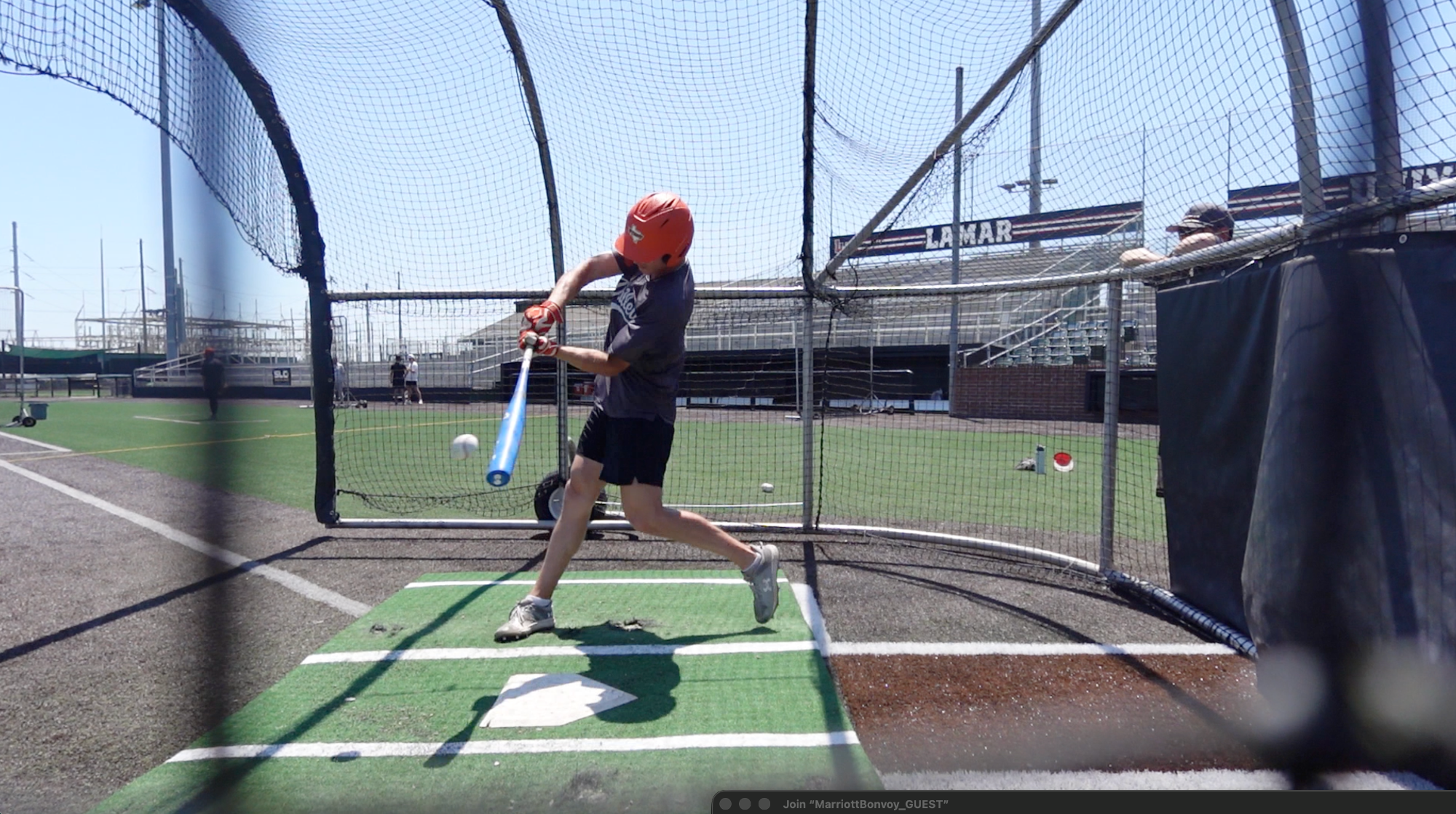 Rocco Garza Gongora about to make contact with a baseball during batting practice at Lamar