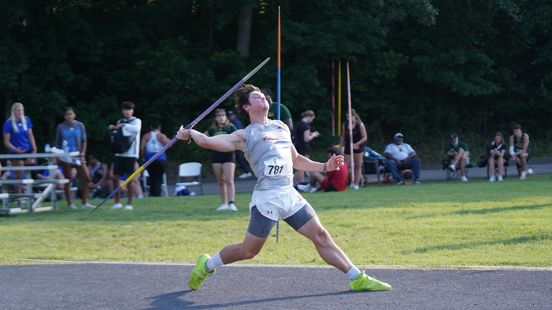 Photo of Matic Vidmar throwing the javelin in a gray UTRGV track & field top and white shorts on the runway at Homer Bryce Stadium