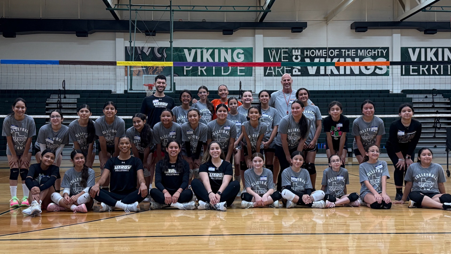 Group photo from last Volleyball camp held at James Pace High School in Brownsville