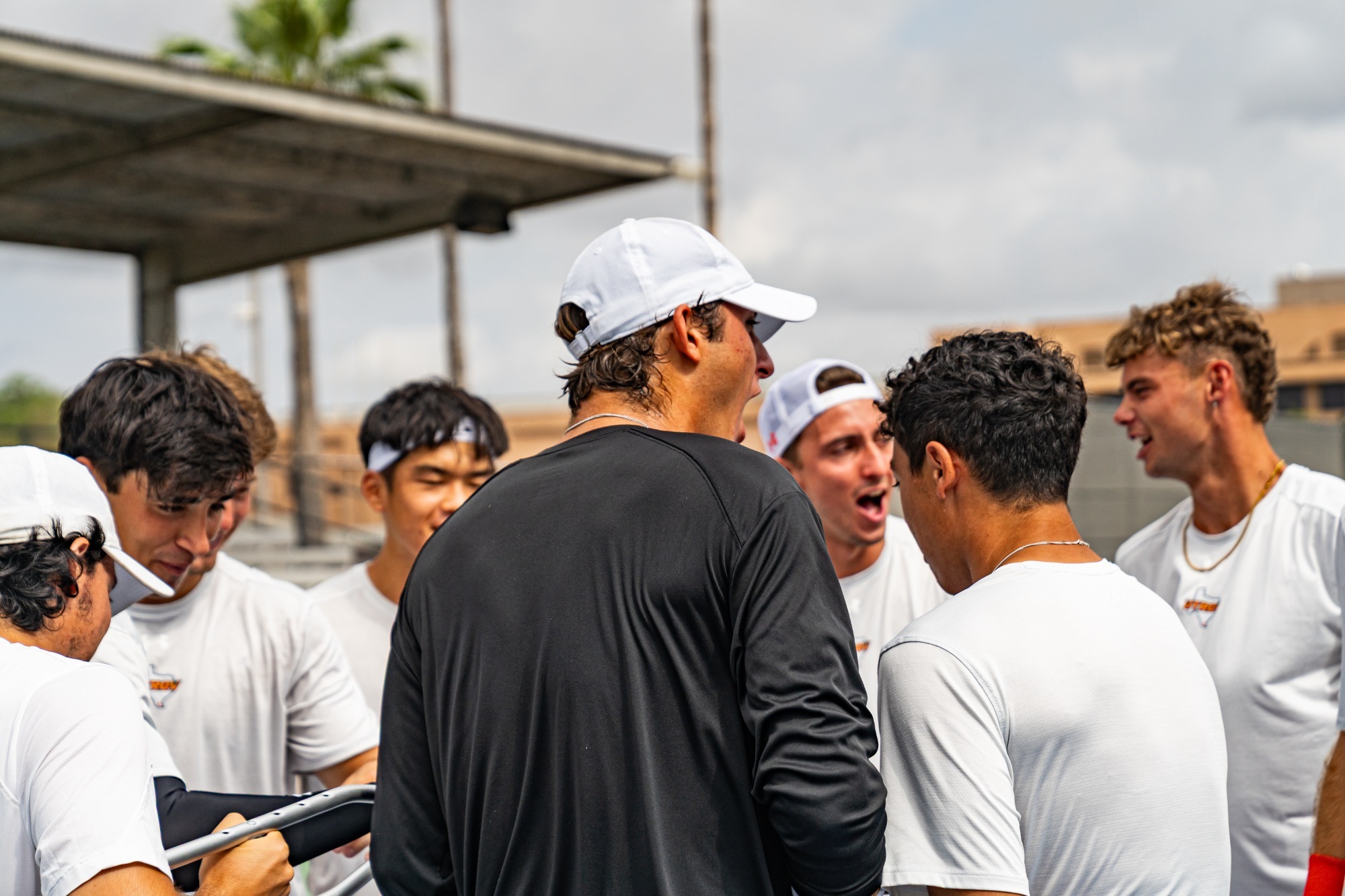 Men's Tennis Team Huddle