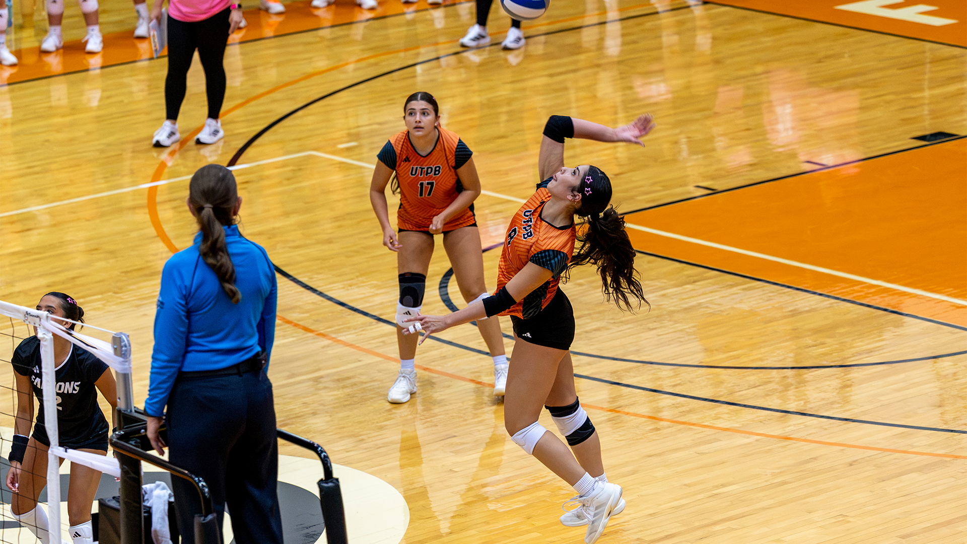 Giselle Orellana going up for the kill