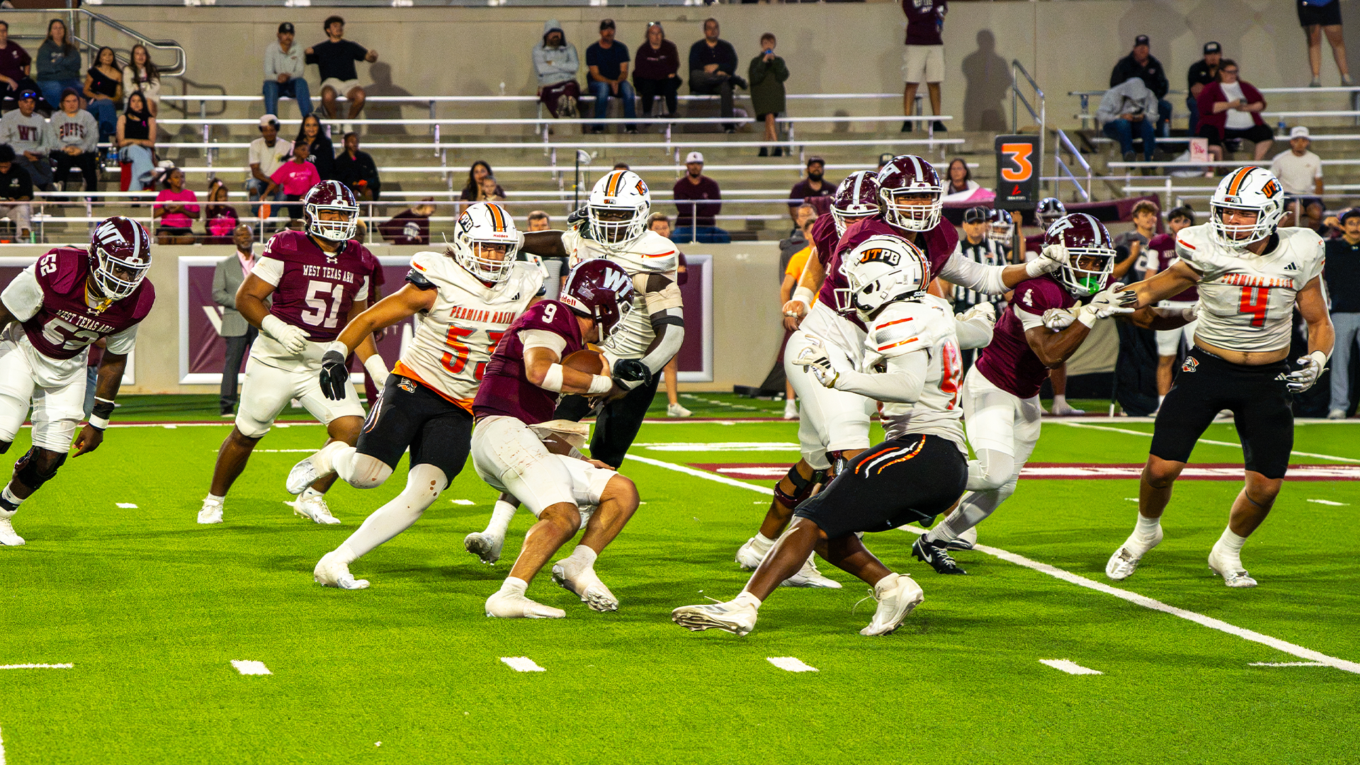Isaiah Mathews sacking the quarterback