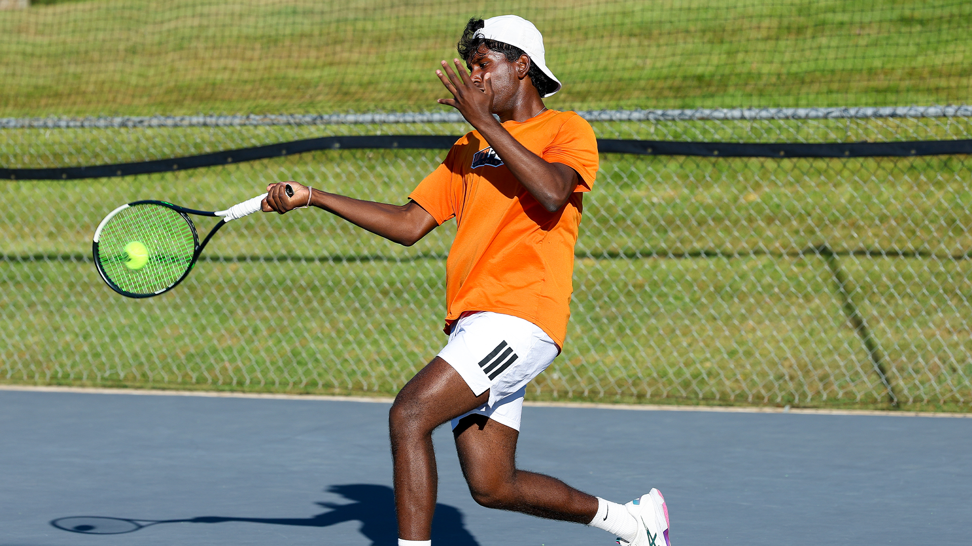 Nehal Naidoo hits the ball