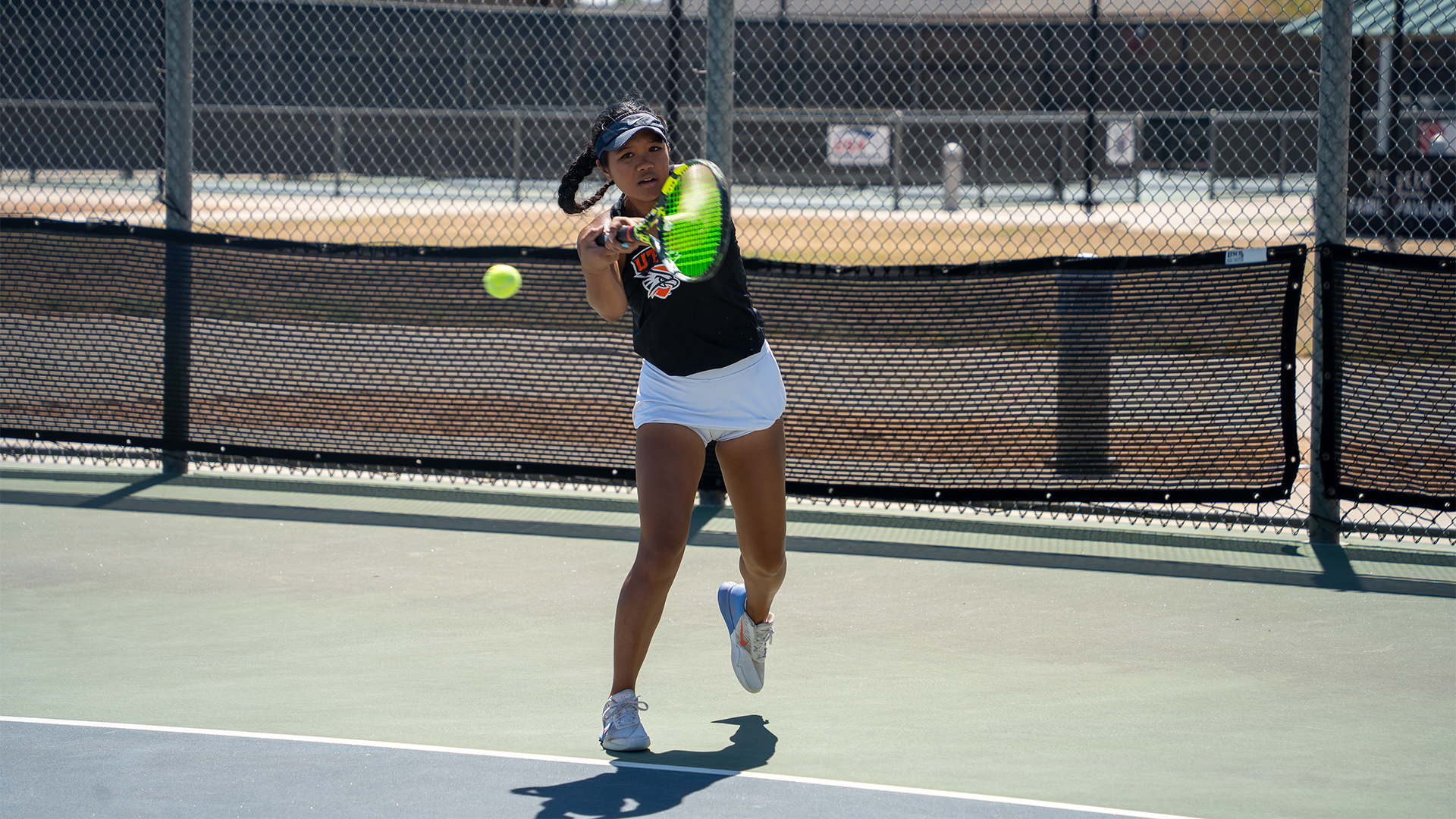 Paige Sitanggang hits the backhand versus St. Mary's