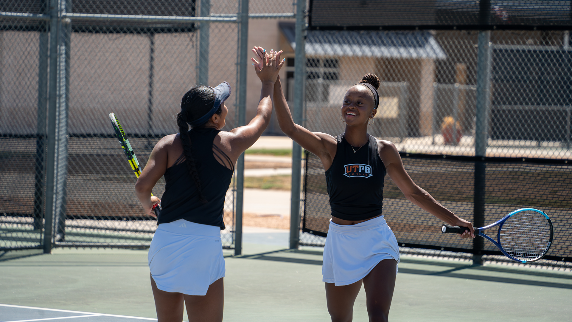 Peyton Jones & Paige Sitanggang celebrate after picking up the point