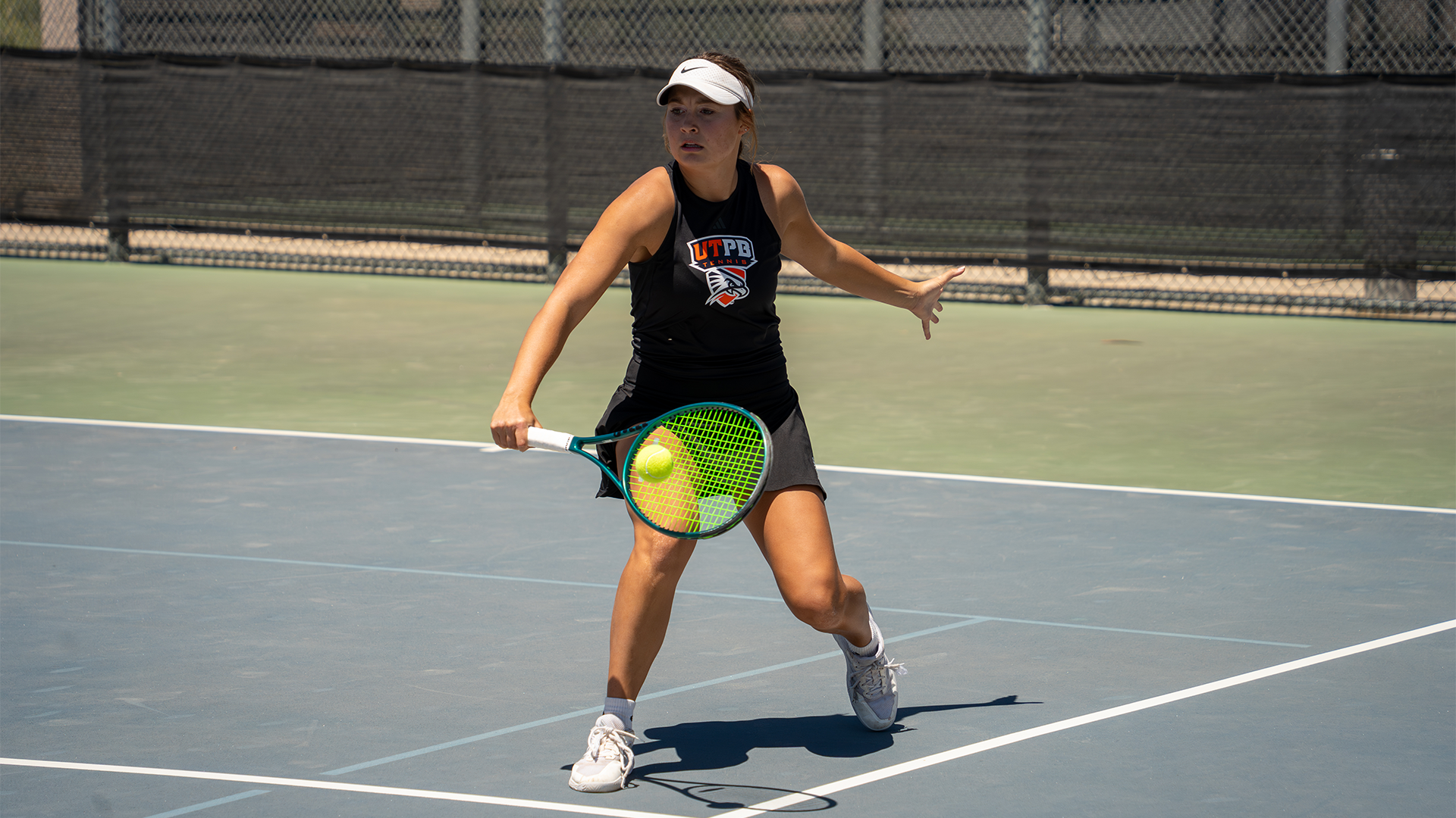  Sophia Crosby hitting ball against Texas A&M Kingsville