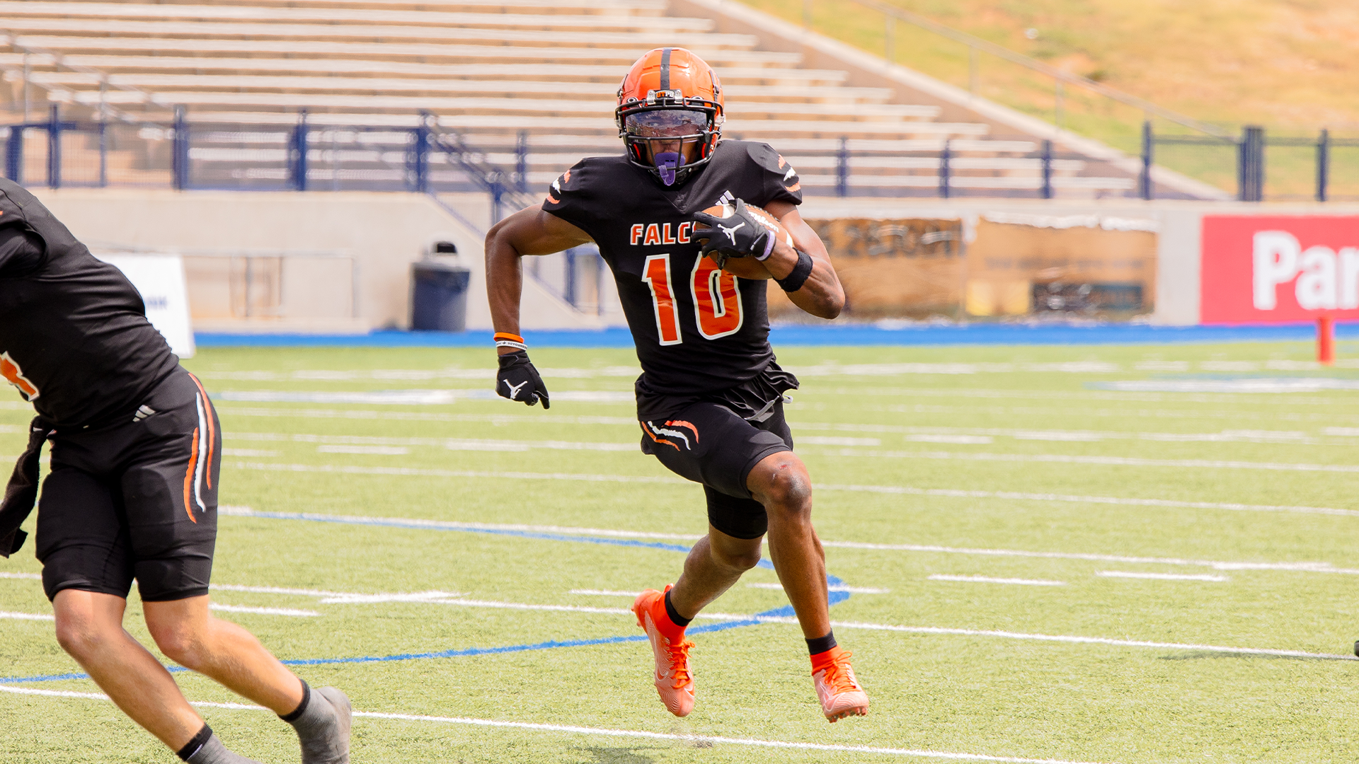 Ben Patterson running with the football against University of Central Oklahoma
