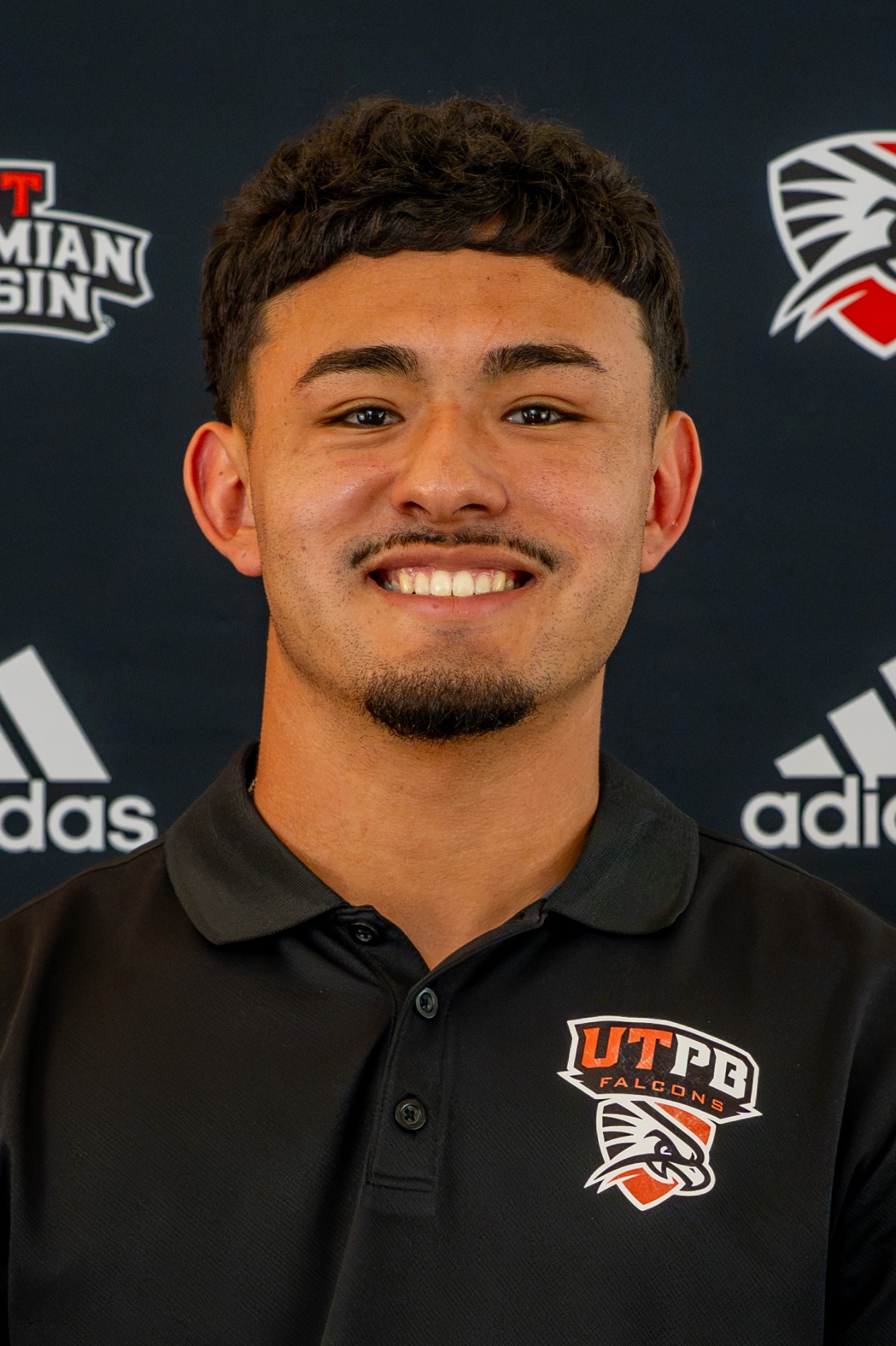 Head shot of Mikey Cota