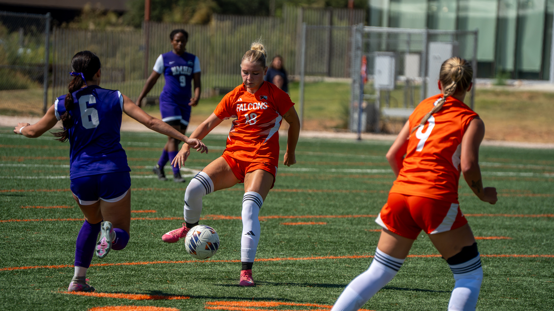 Jayden Murgia passing the ball