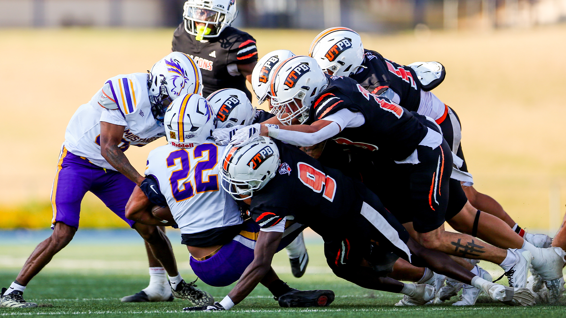Falcons tackling ball carrier