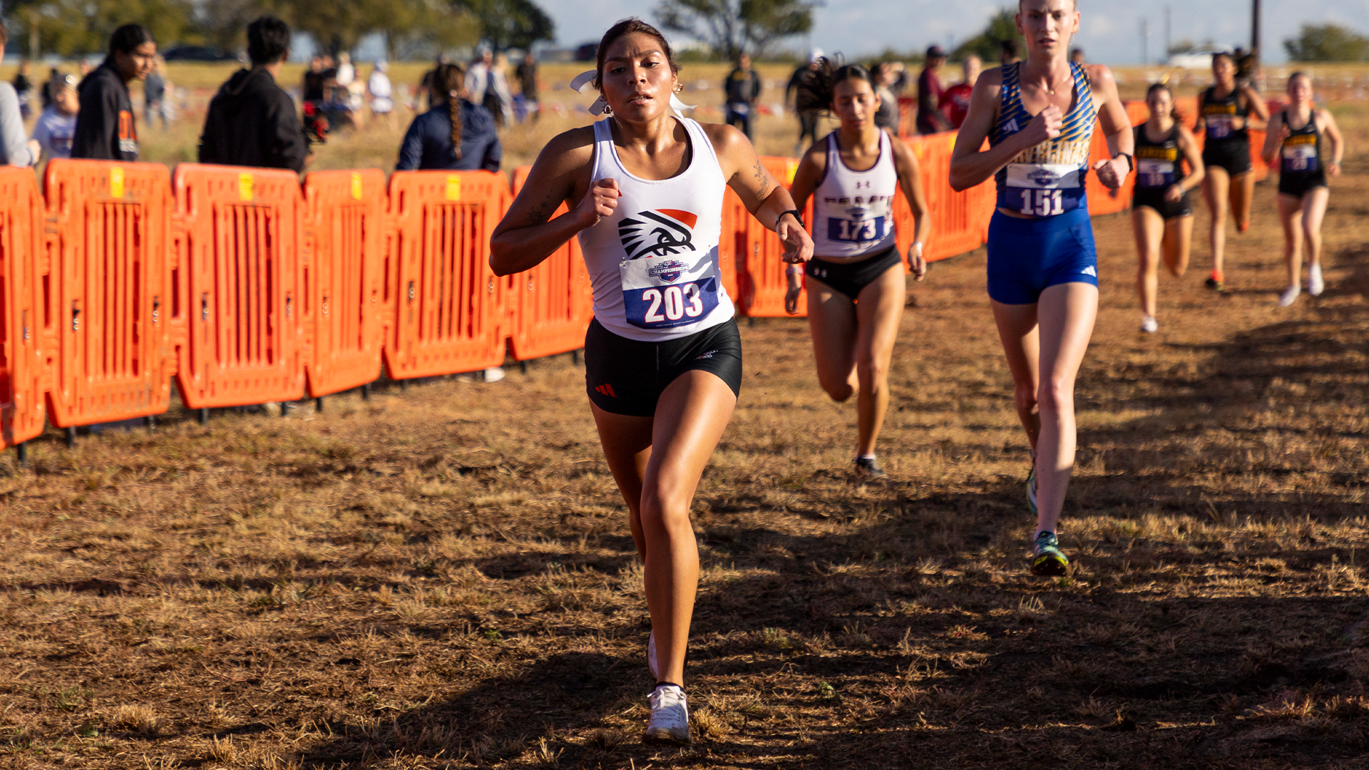 Celine Maldonado crossing the finish line