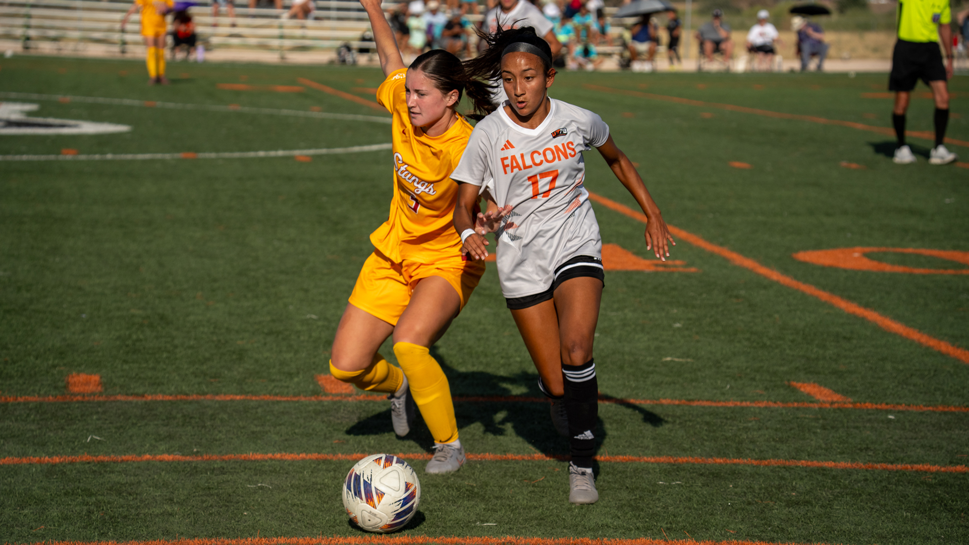  Emily Morales attacking the ball against Midwestern State