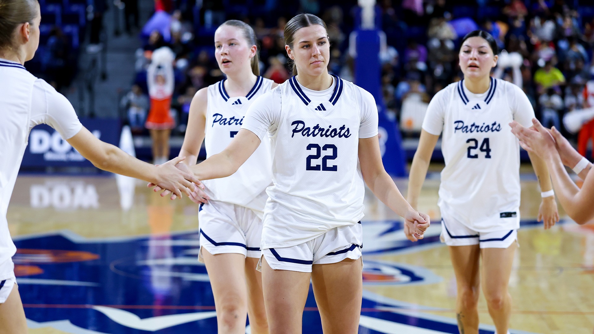 Jorja Hart goes for a high five prior to taking on a free throw against Jarvis Christian.