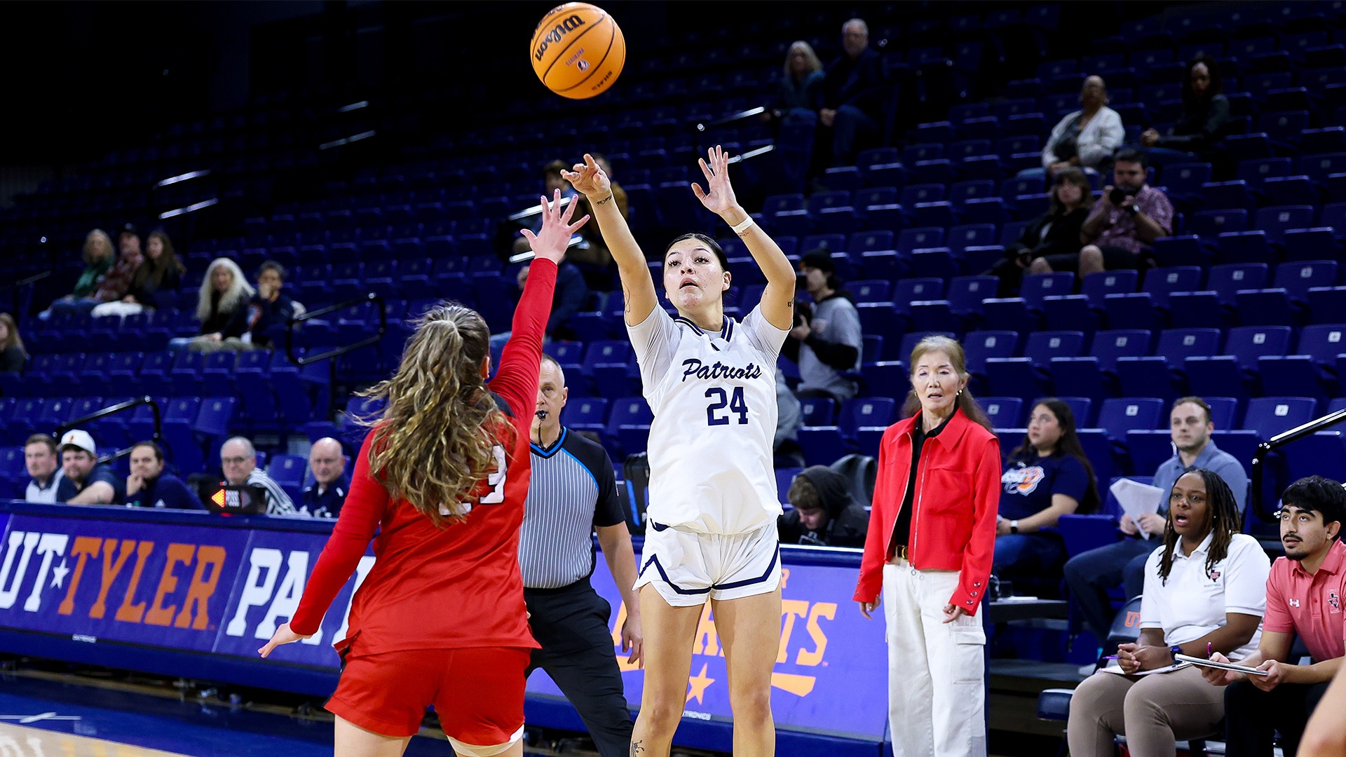 KK Bass shoots a three pointer against Sul Ross State.