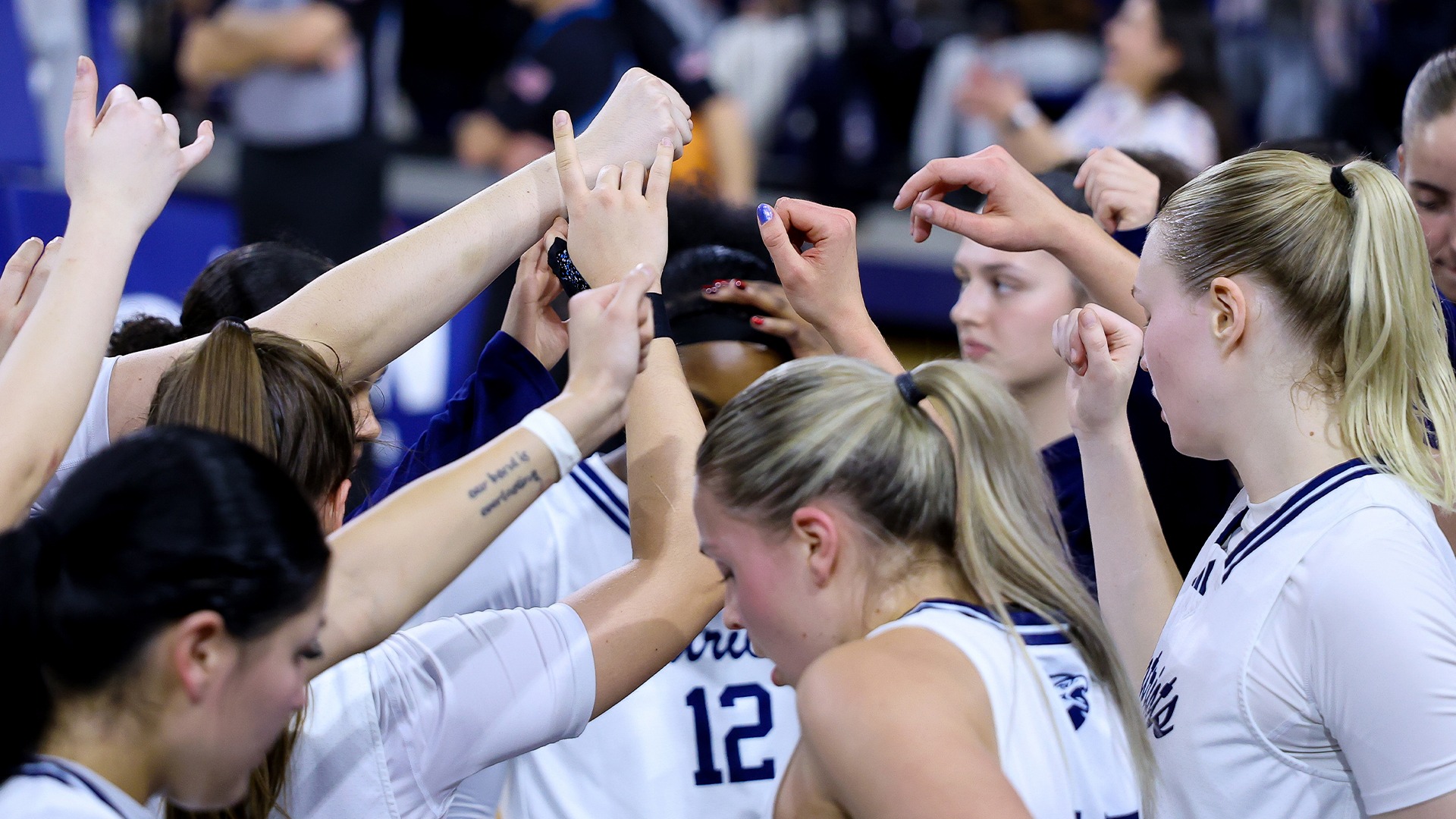 UT Tyler Women's Basketball breaks a huddle against Lubbock Christian.