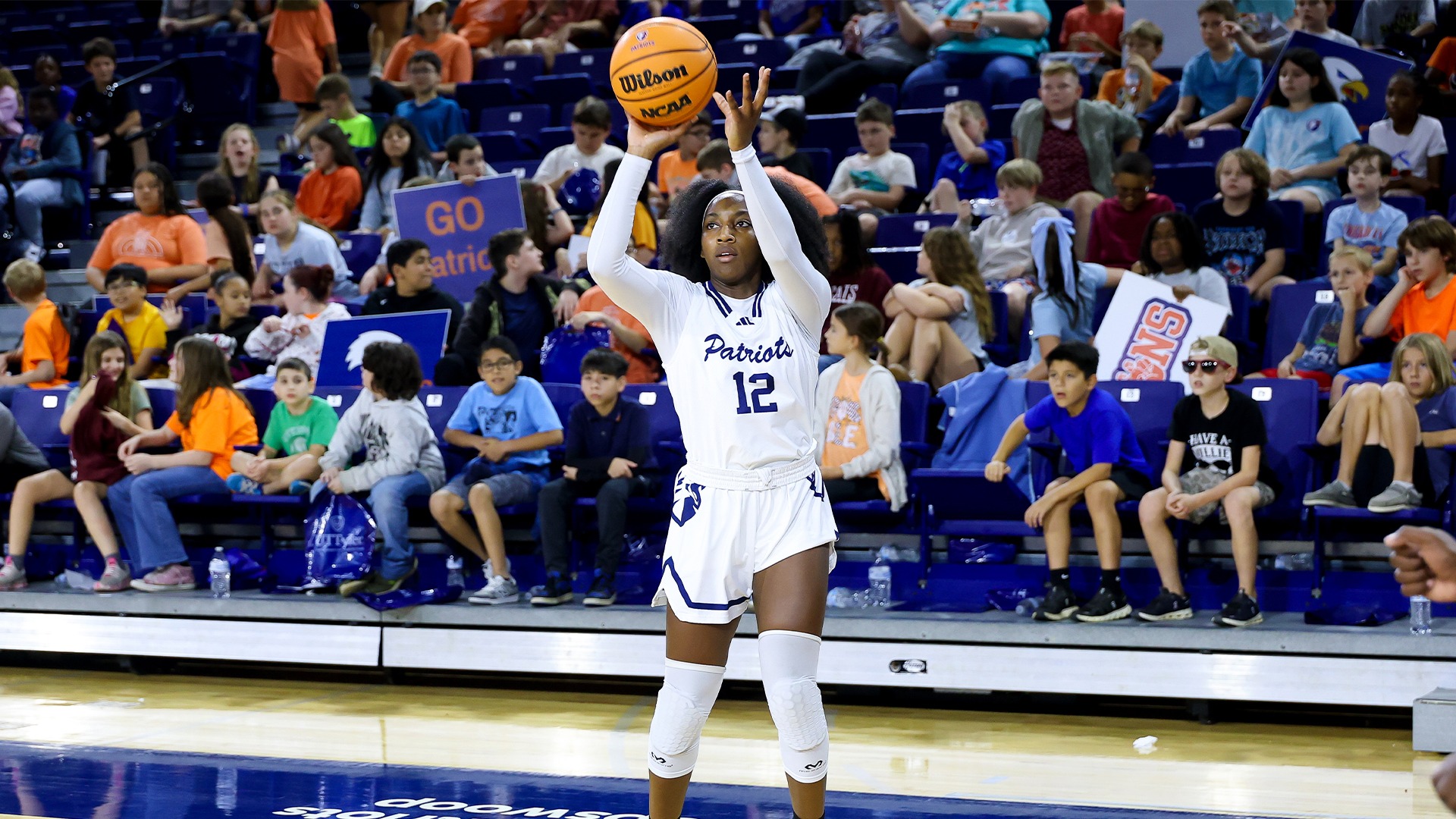 Mariah Neal attempts a three pointer against Jarvis Christian.