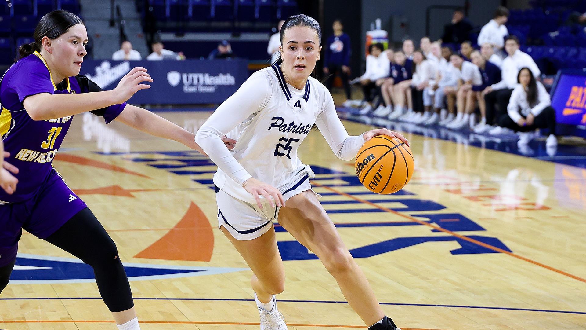 Leila Davis drives to the basket against Western New Mexico