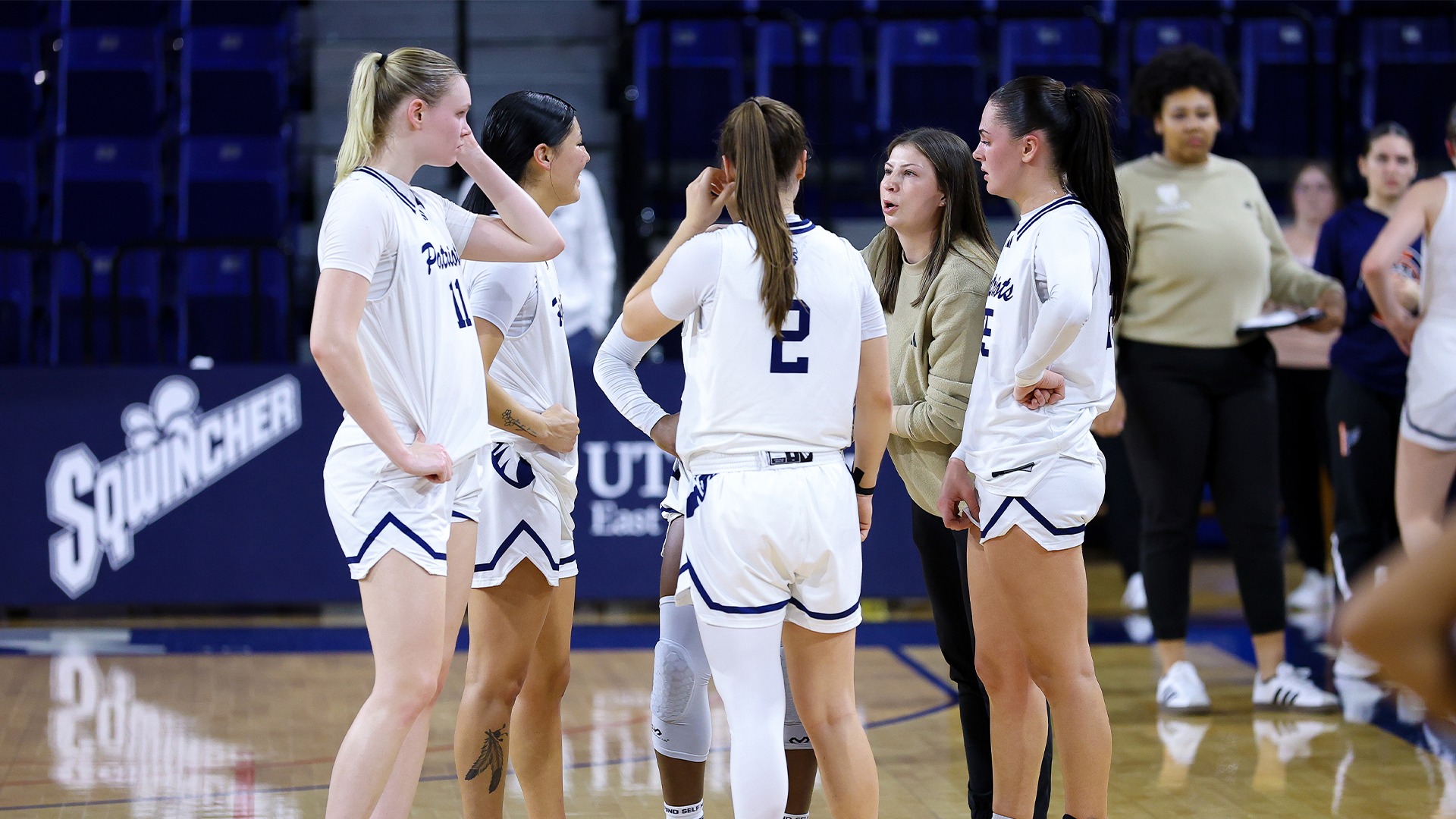 Women's Basketball huddles up during the Midwestern State game.