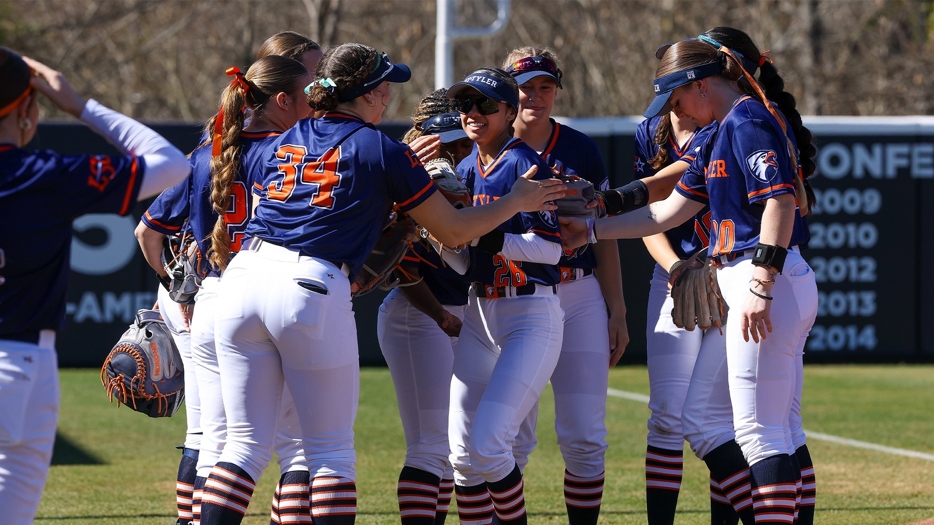 UT Tyler Softball huddles up prior to taking on Northeastern State