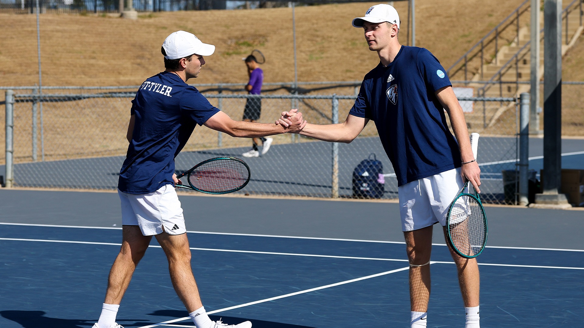 Trevor Short and Job Japelj celebrate a point against Jacksonville College.