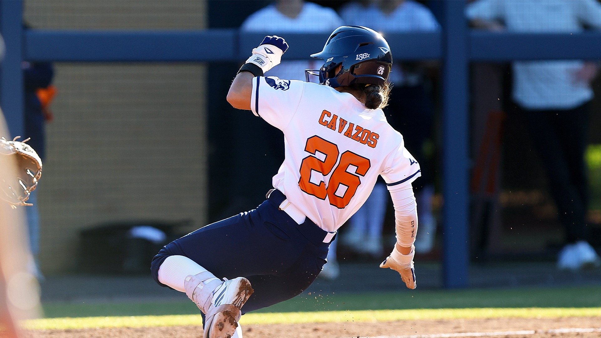 Kaylee Cavazos slides into third against Hillsdale College