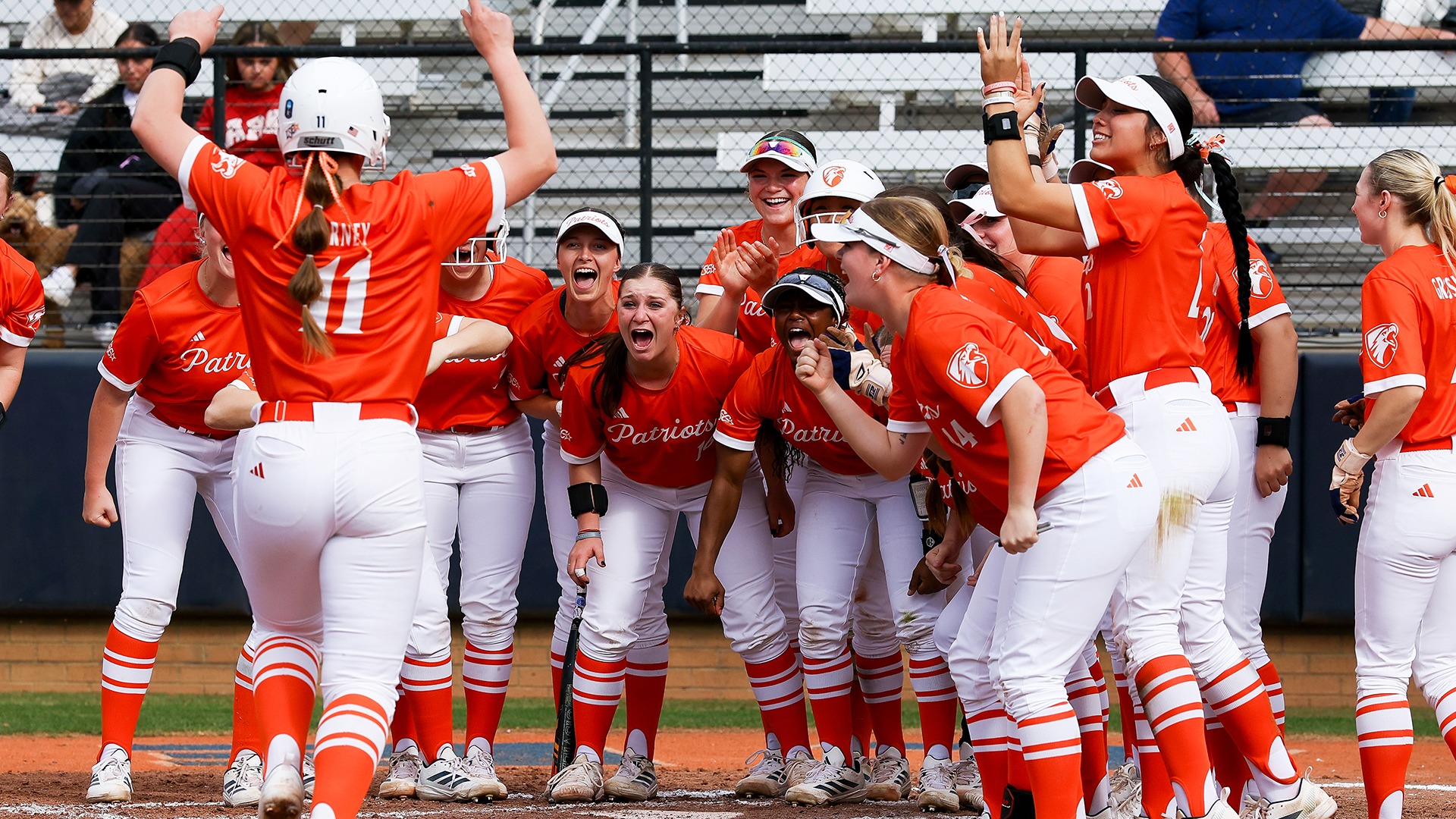 Taryn Barney heads to the plate after a home run against Northeastern State