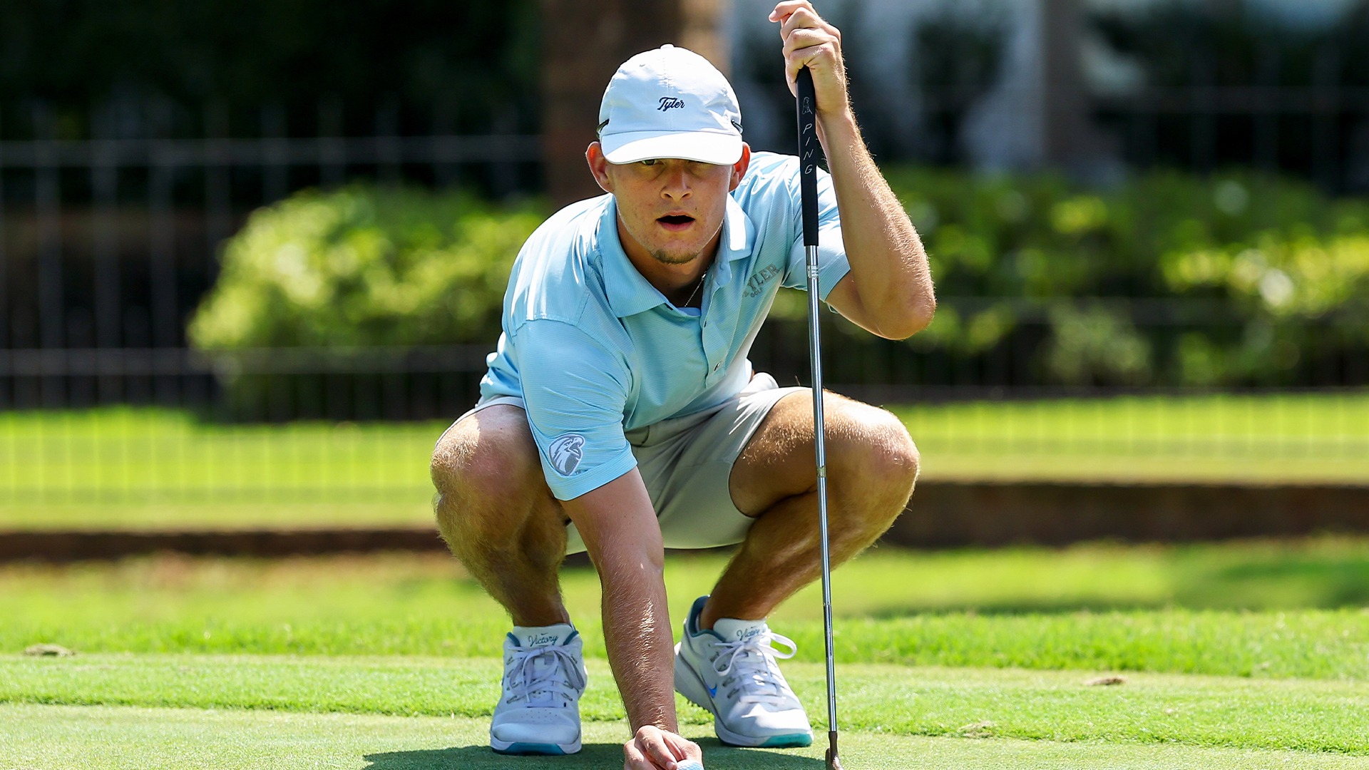 Preston DeSerrano lines up a putt