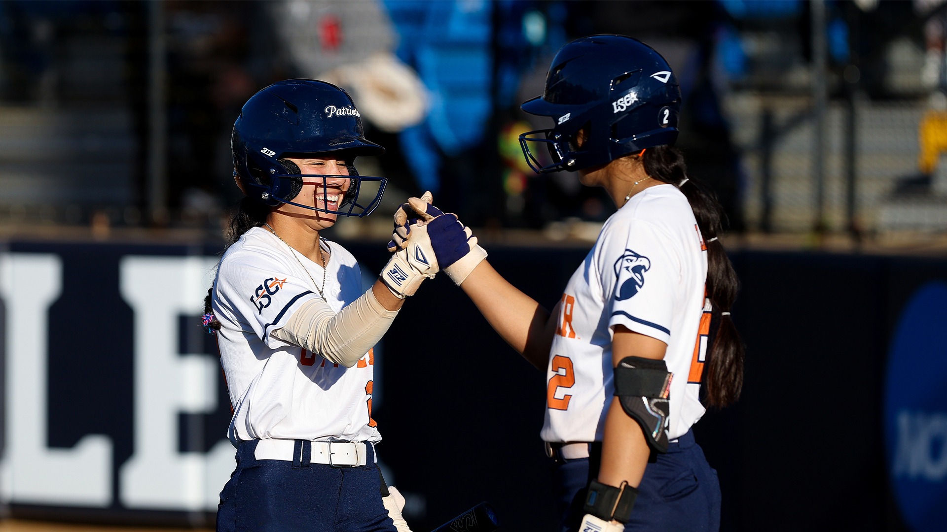 Kaylee Cavazos and Kaelyn Lerma celebrate a big play against Western New Mexico.