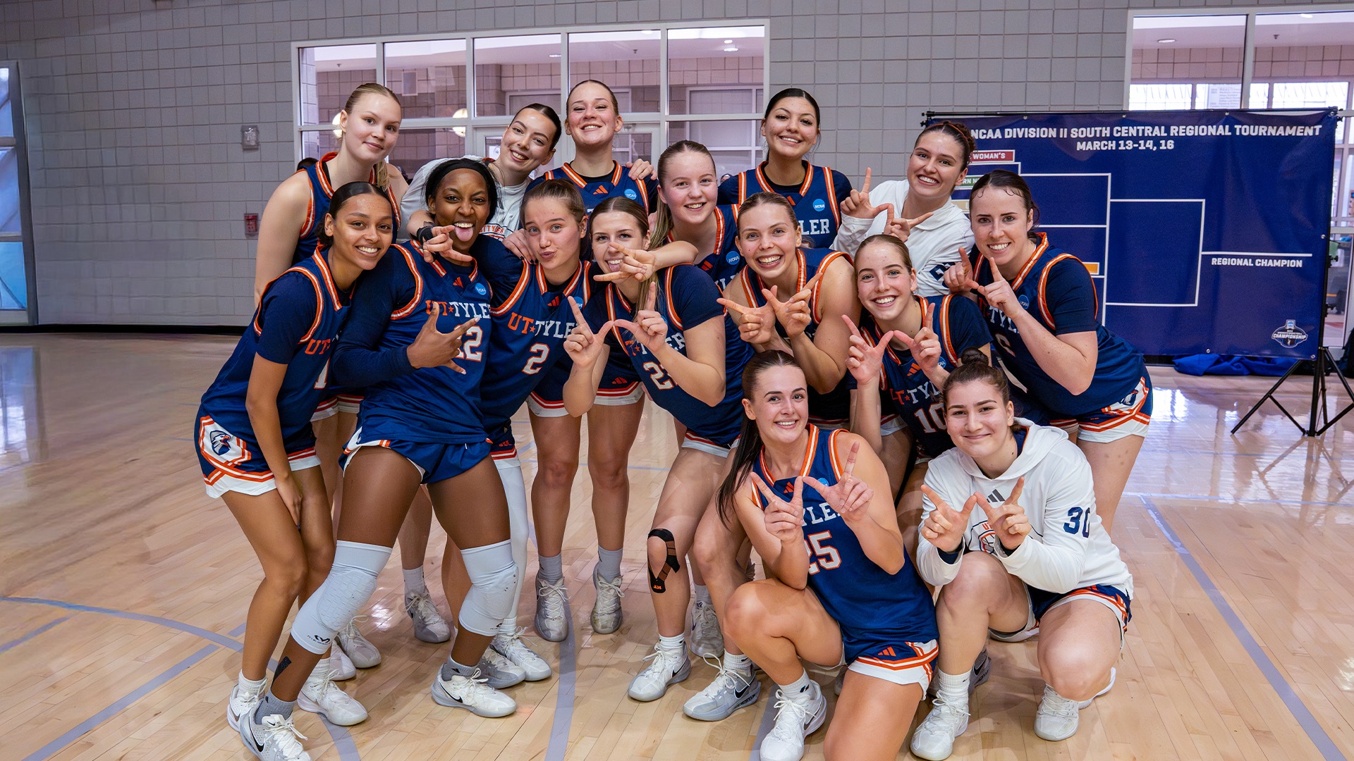 UT Tyler Women's Basketball celebrates after a huge win over West Texas A&M in the NCAA Tournament