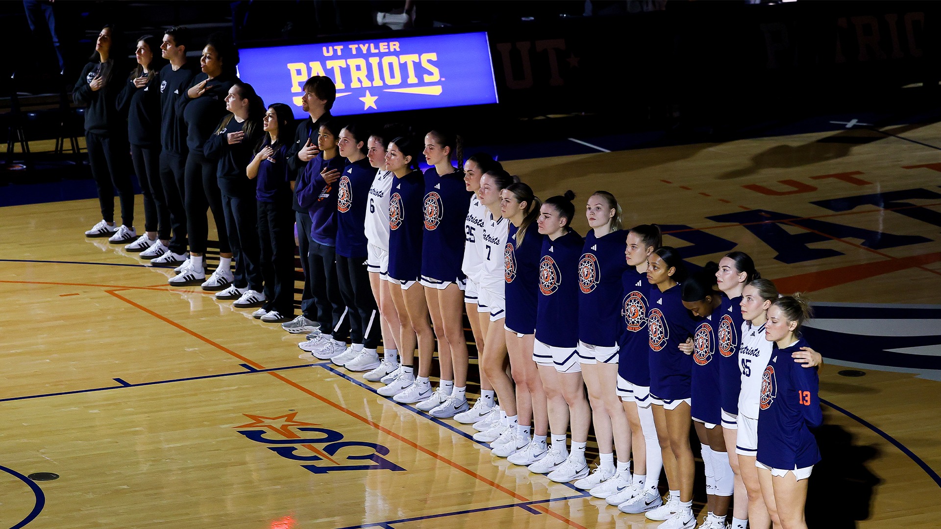 UT Tyler women's basketball lines up for the national anthem
