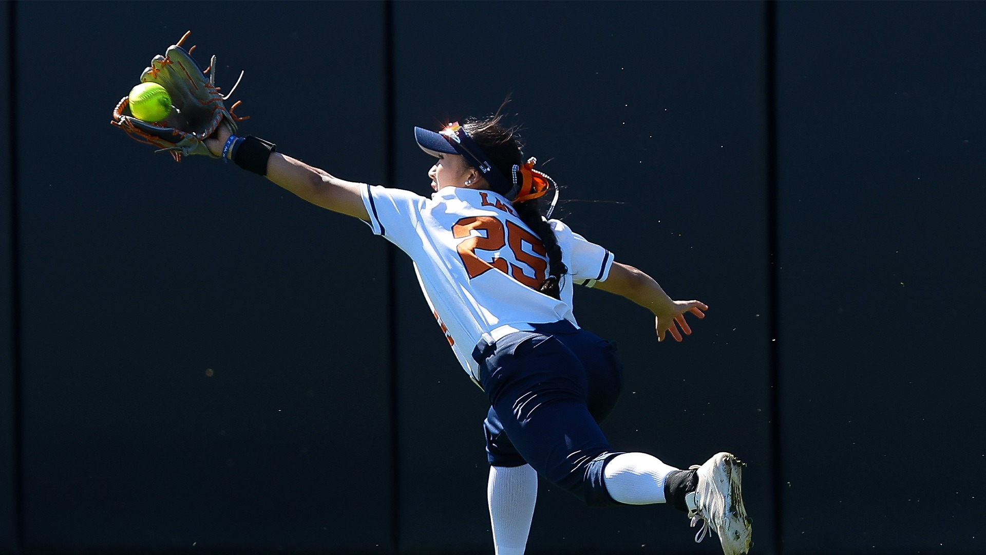 Megan Lau extends for a catch against Western New Mexico