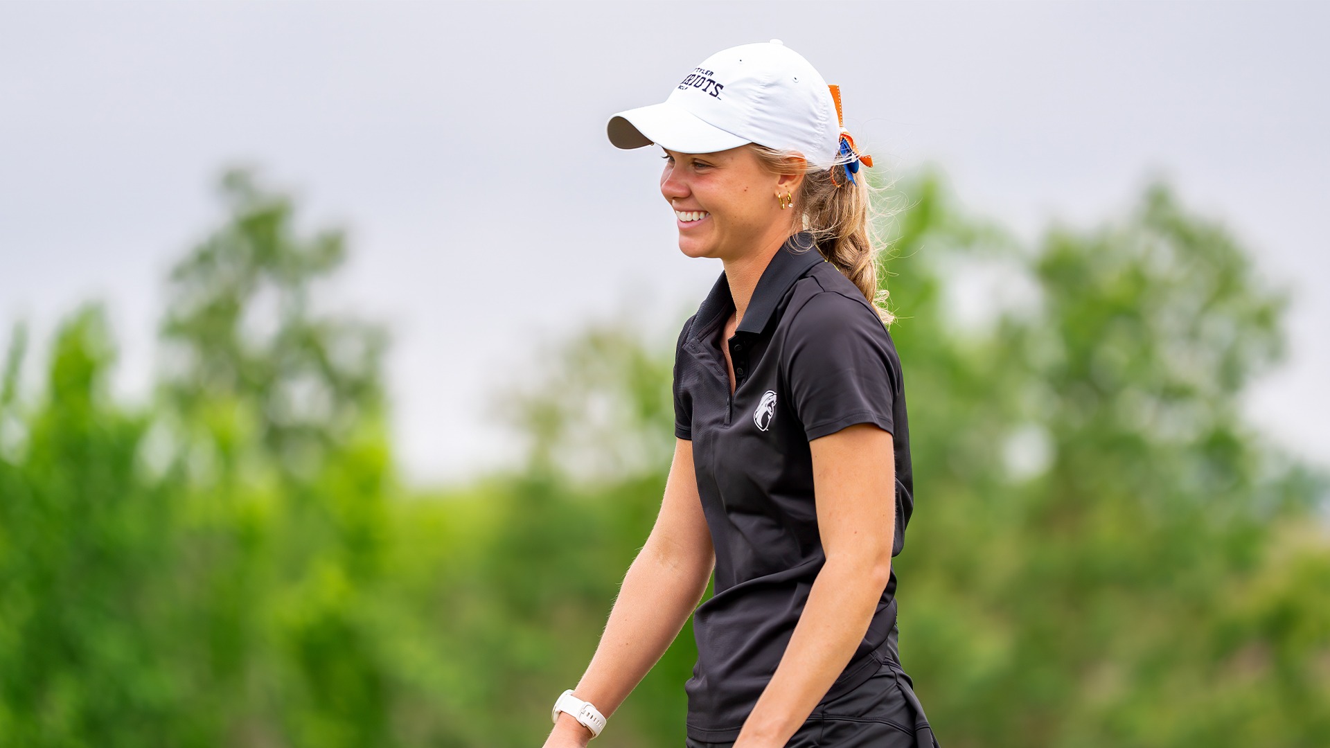 Martha Laremark smiles after a shot on day one of the LSC Championship.