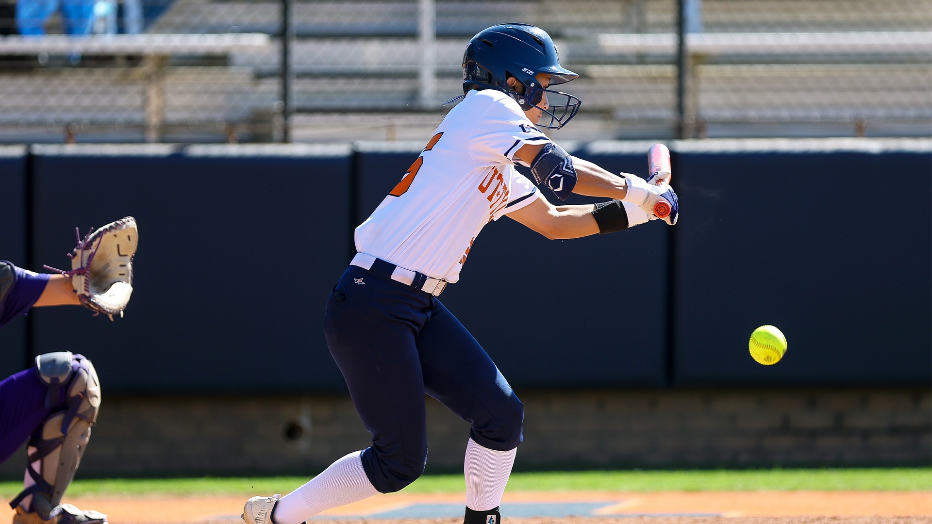 Megan Lau drops a bunt against Western New Mexico