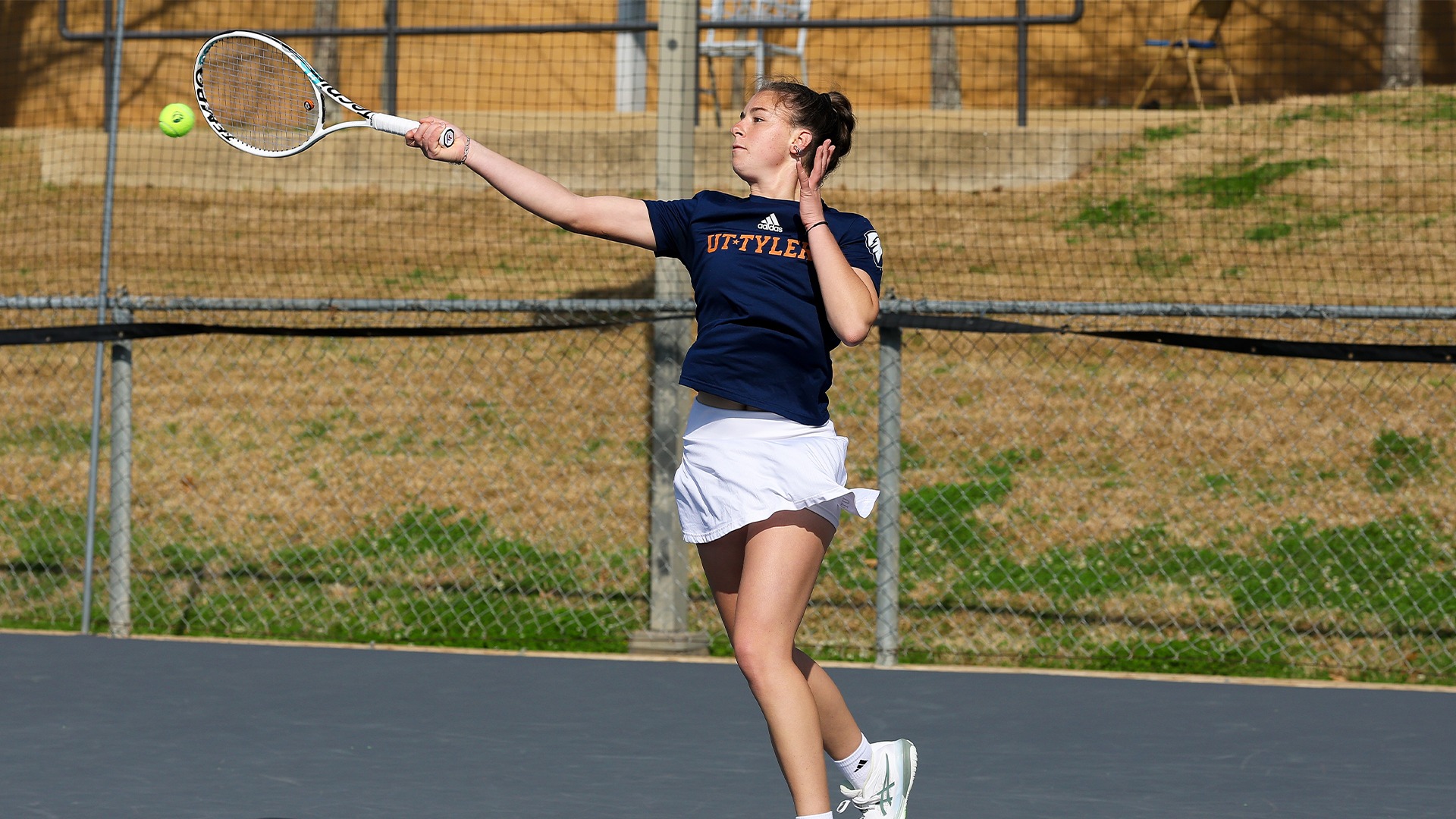 Maria Antonio Ortega hits a forehand against Harding.