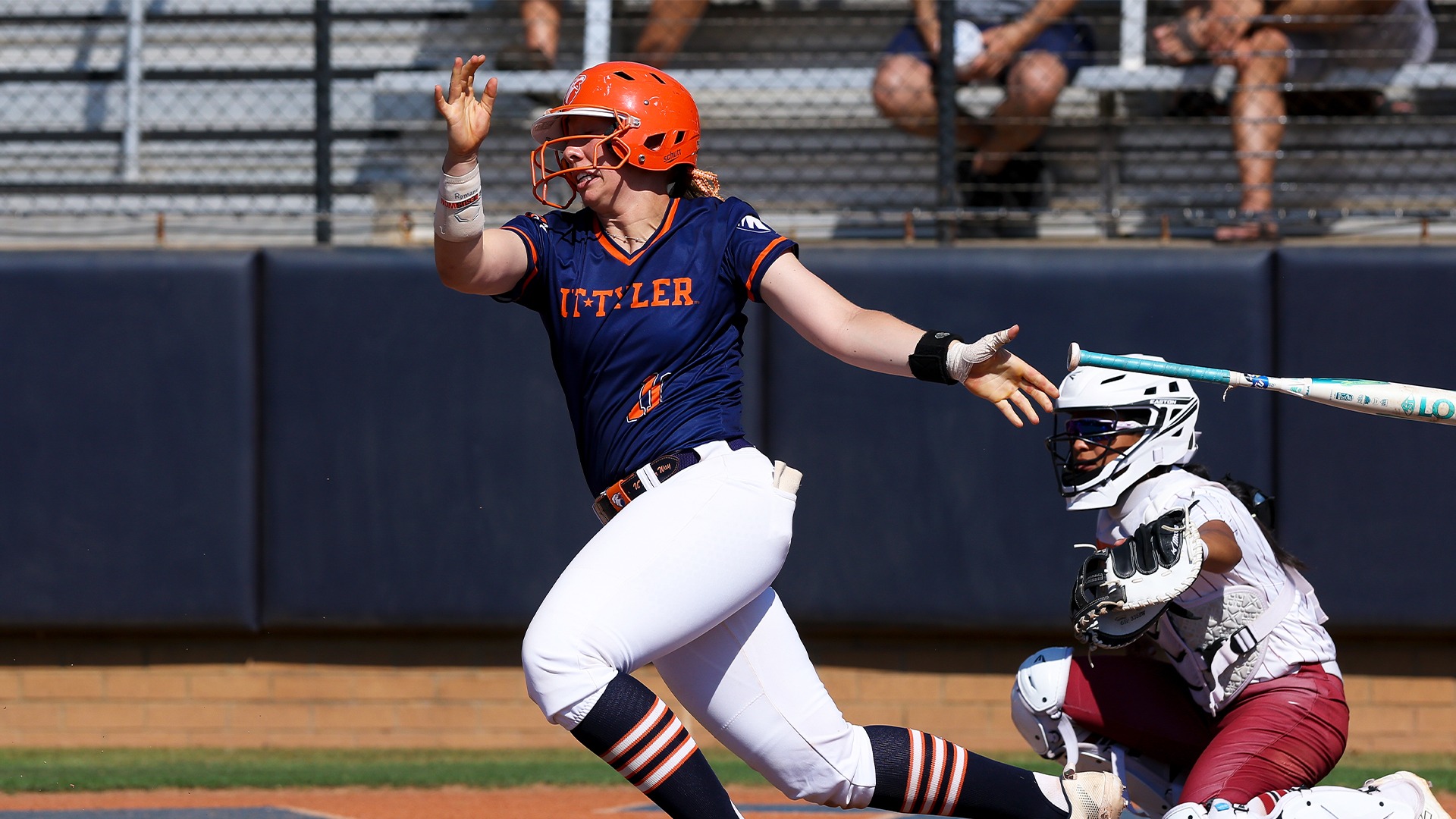 Taryn Barney gets a base hit against Midwestern State