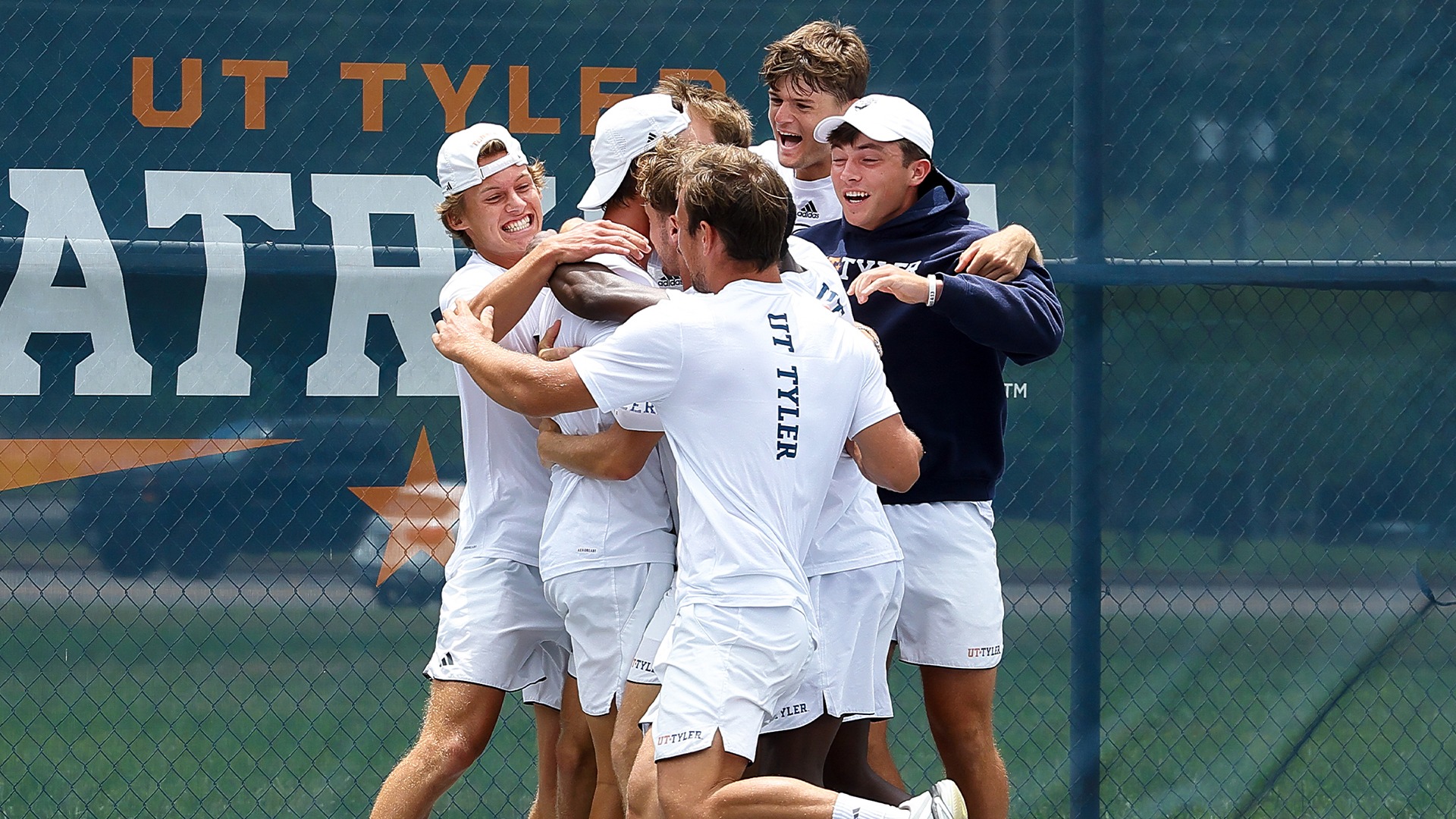 UT Tyler Men's Tennis celebrates after winning a share of the NCAA South Central Regional over Cameron.
