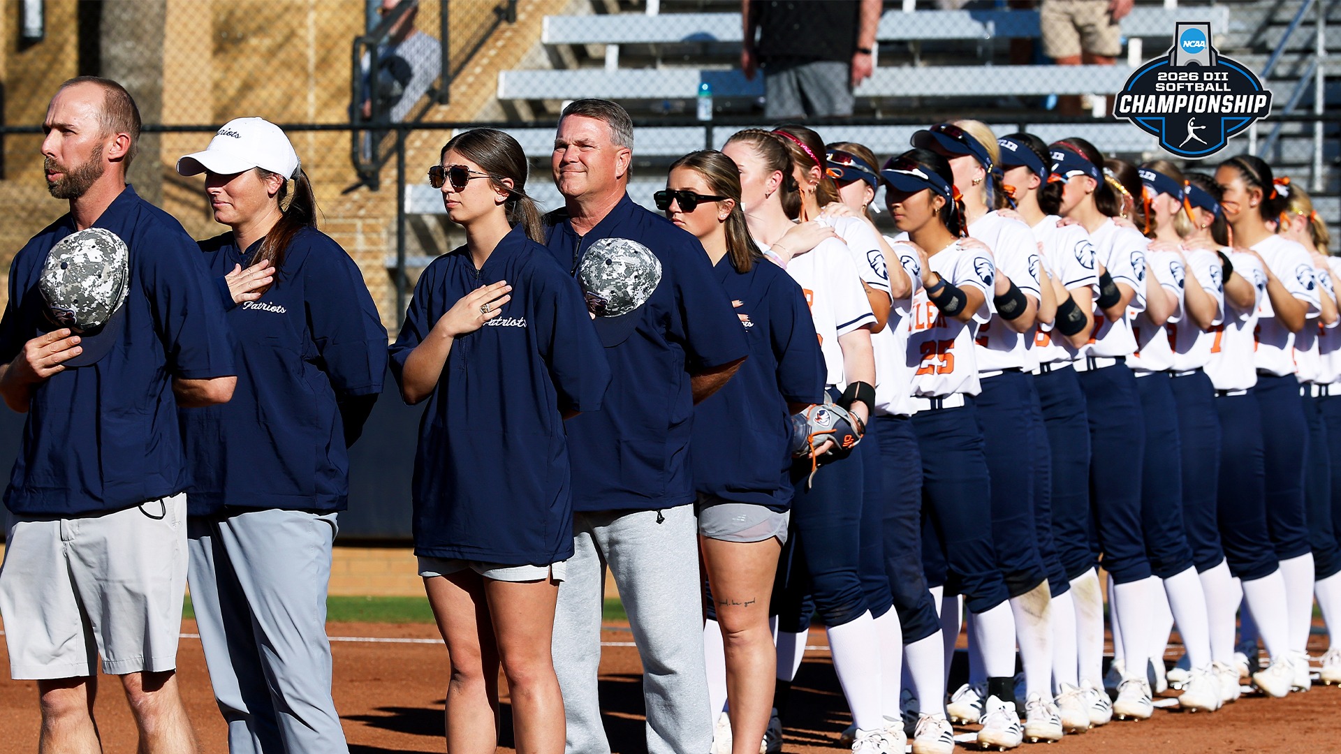 UT Tyler Softball lines up for the national anthem in their first home game of the year
