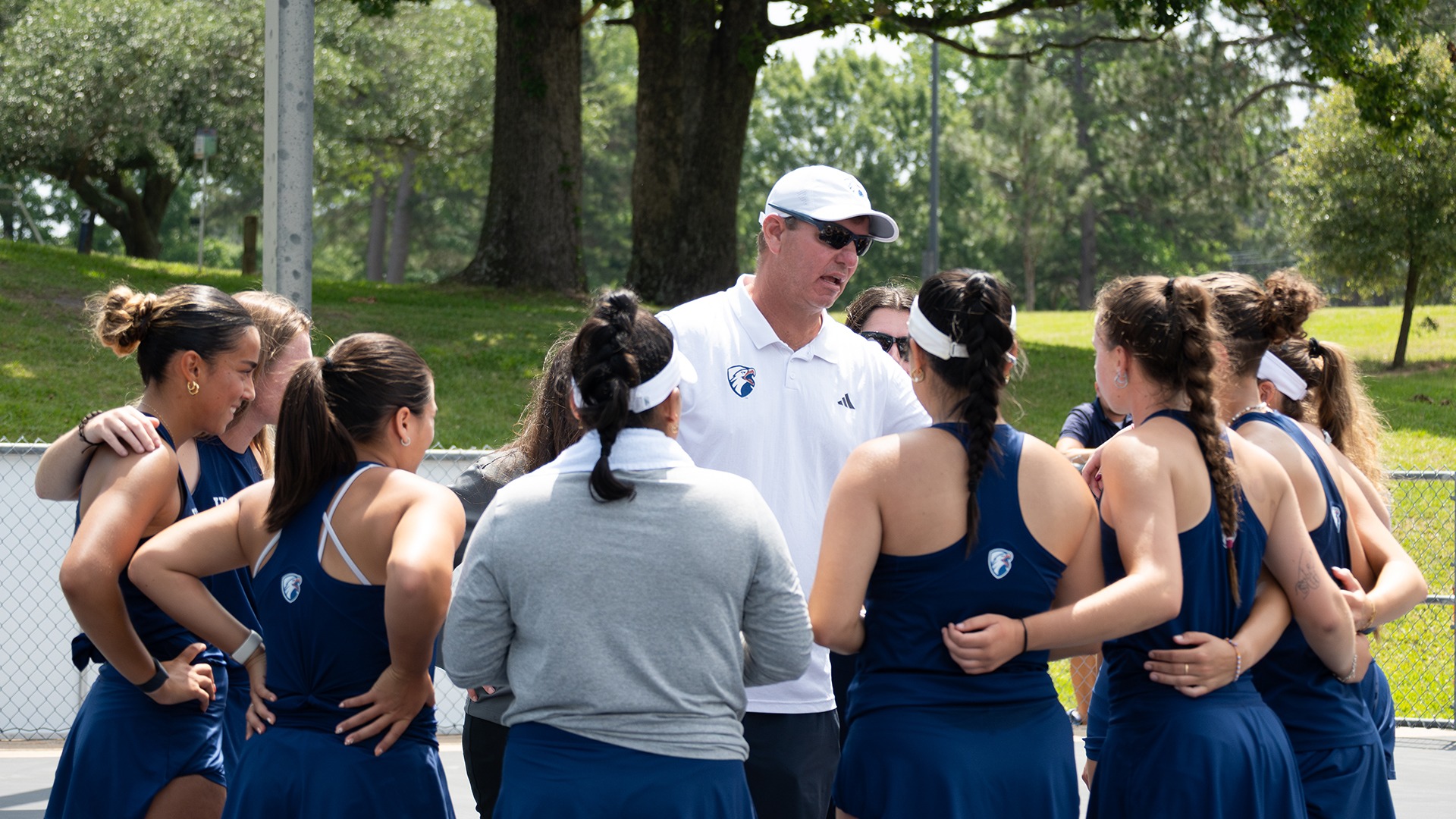 Chris Bizot consults his team prior to taking on Cameron.