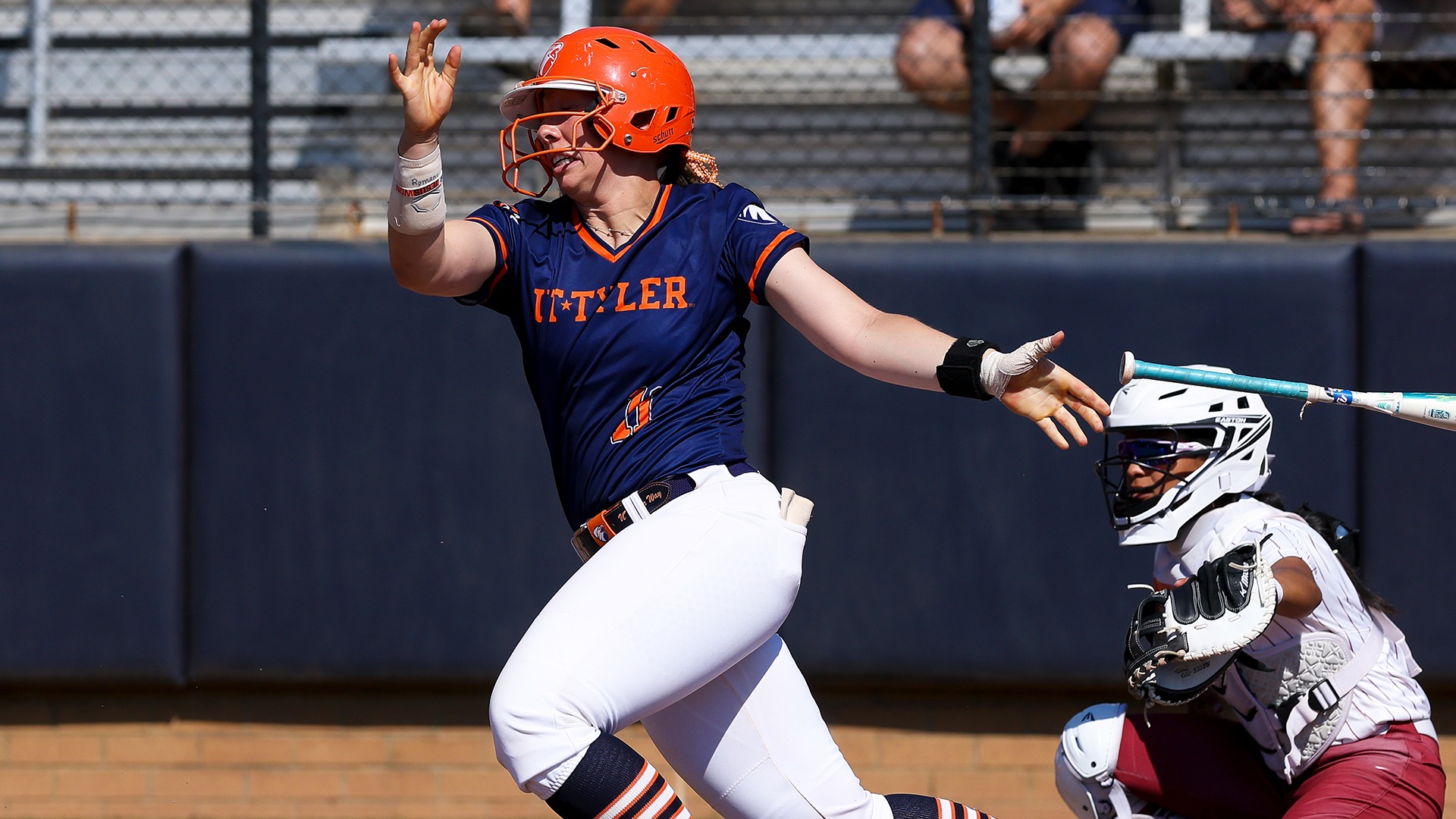 Taryn Barney puts a ball in play against Texas Woman's.