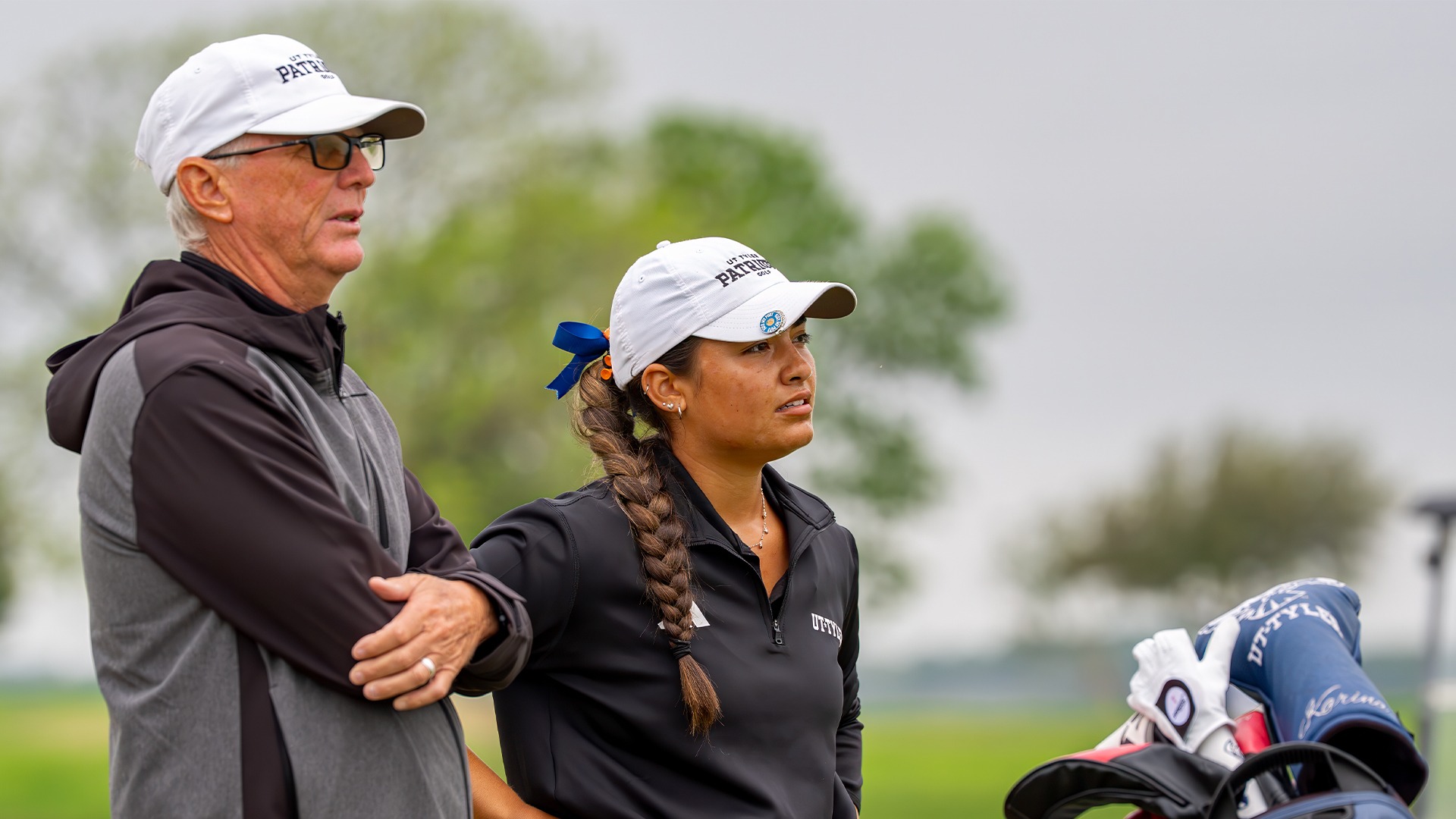 Grant Spencer and Karina Duran talk over a shot at the LSC Championship