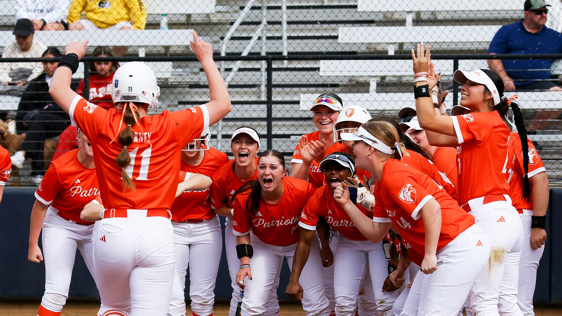 Taryn Barney celebrates after a homer with her teammates.