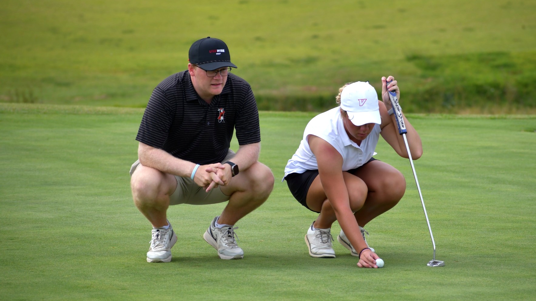 Jacob Sowers coaching Abby Bradley at King Invitational  2025